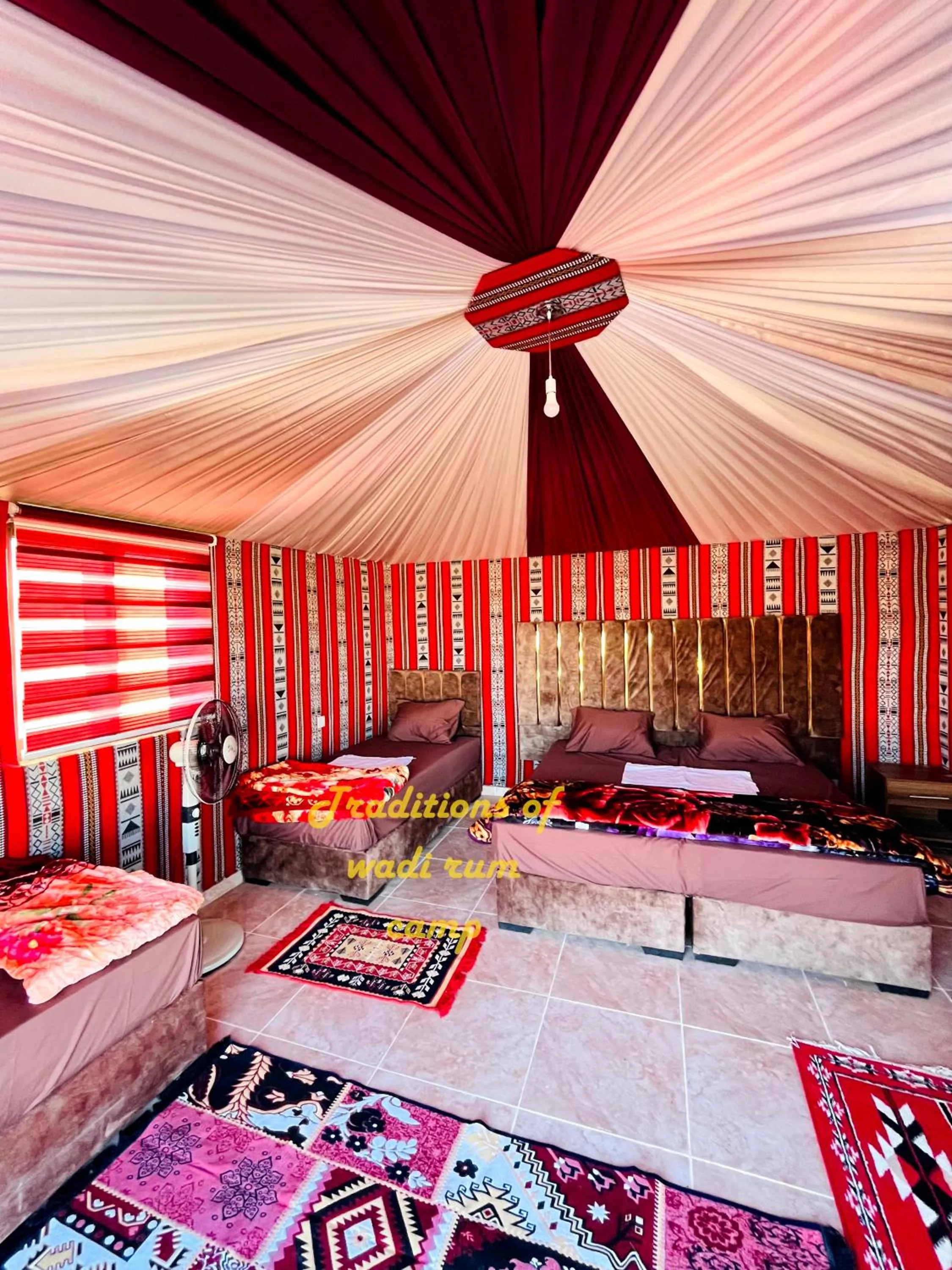Bed in Traditions of Wadi Rum camp & jeep tour