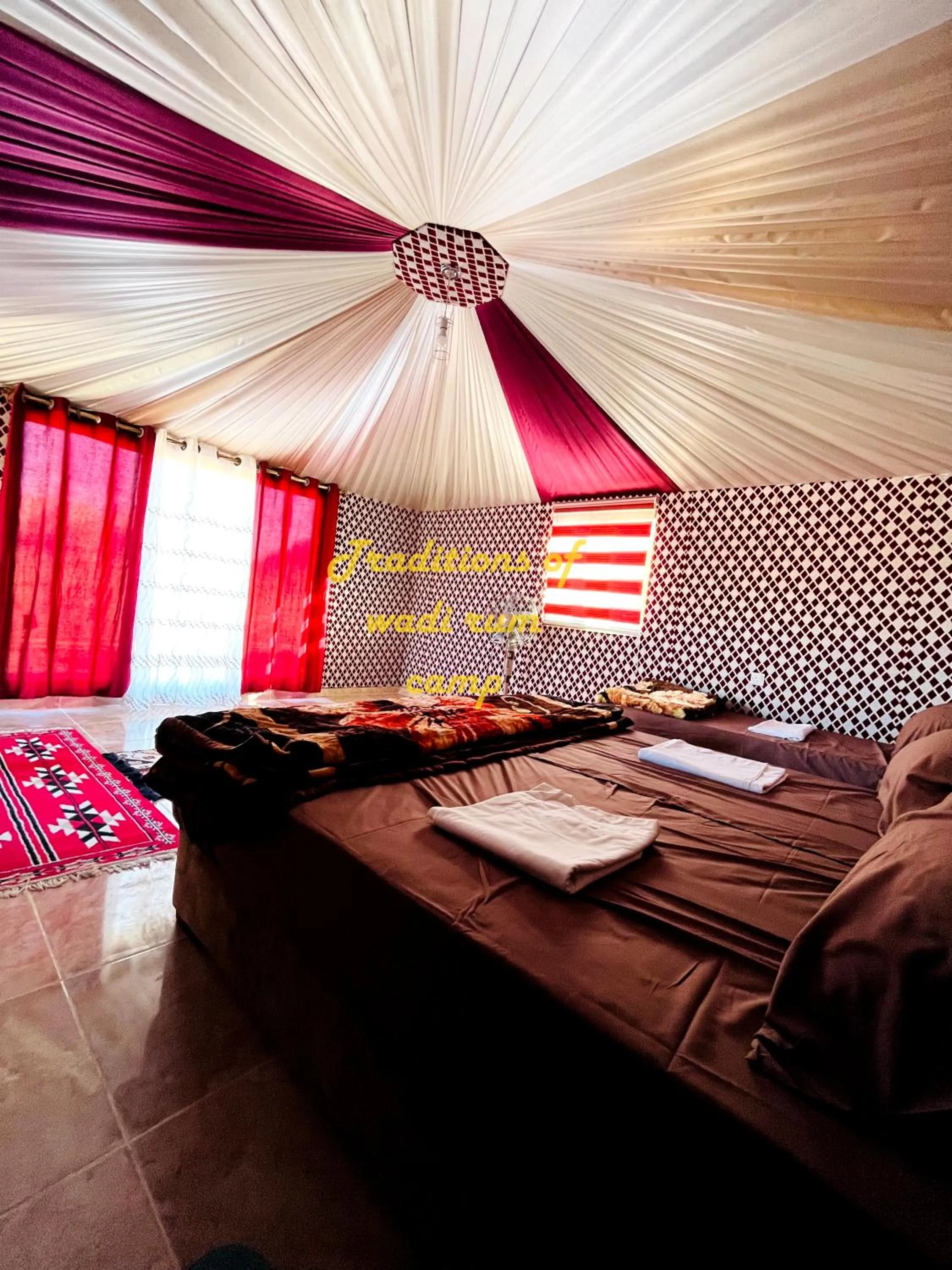 Bed in Traditions of Wadi Rum camp & jeep tour