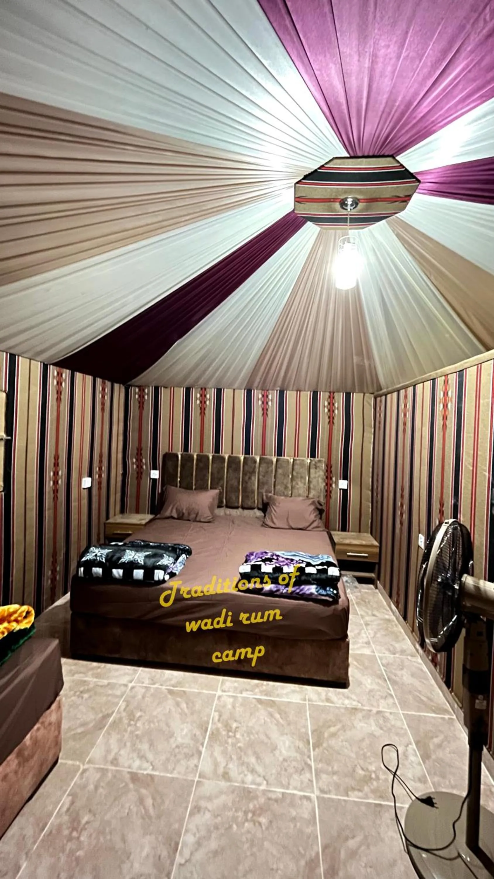 Bed in Traditions of Wadi Rum camp & jeep tour