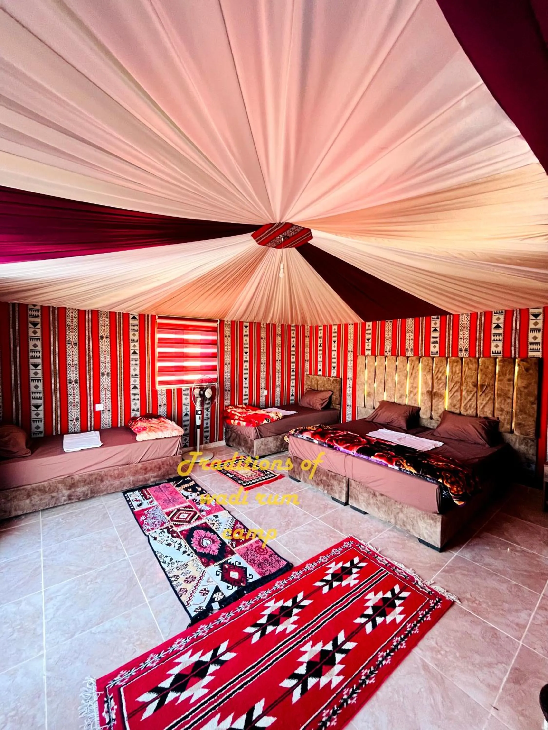 Bed in Traditions of Wadi Rum camp & jeep tour