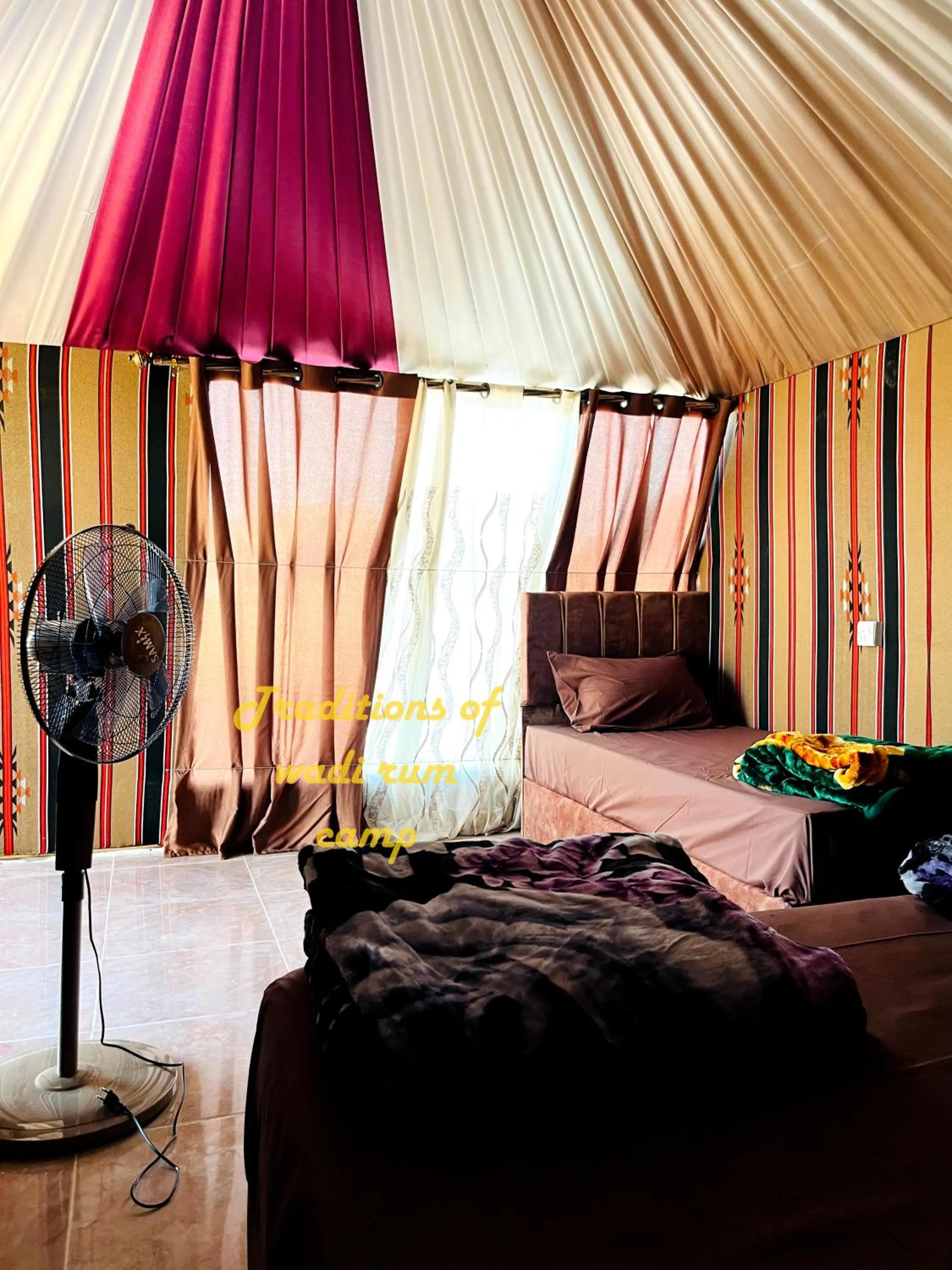 Bed in Traditions of Wadi Rum camp & jeep tour
