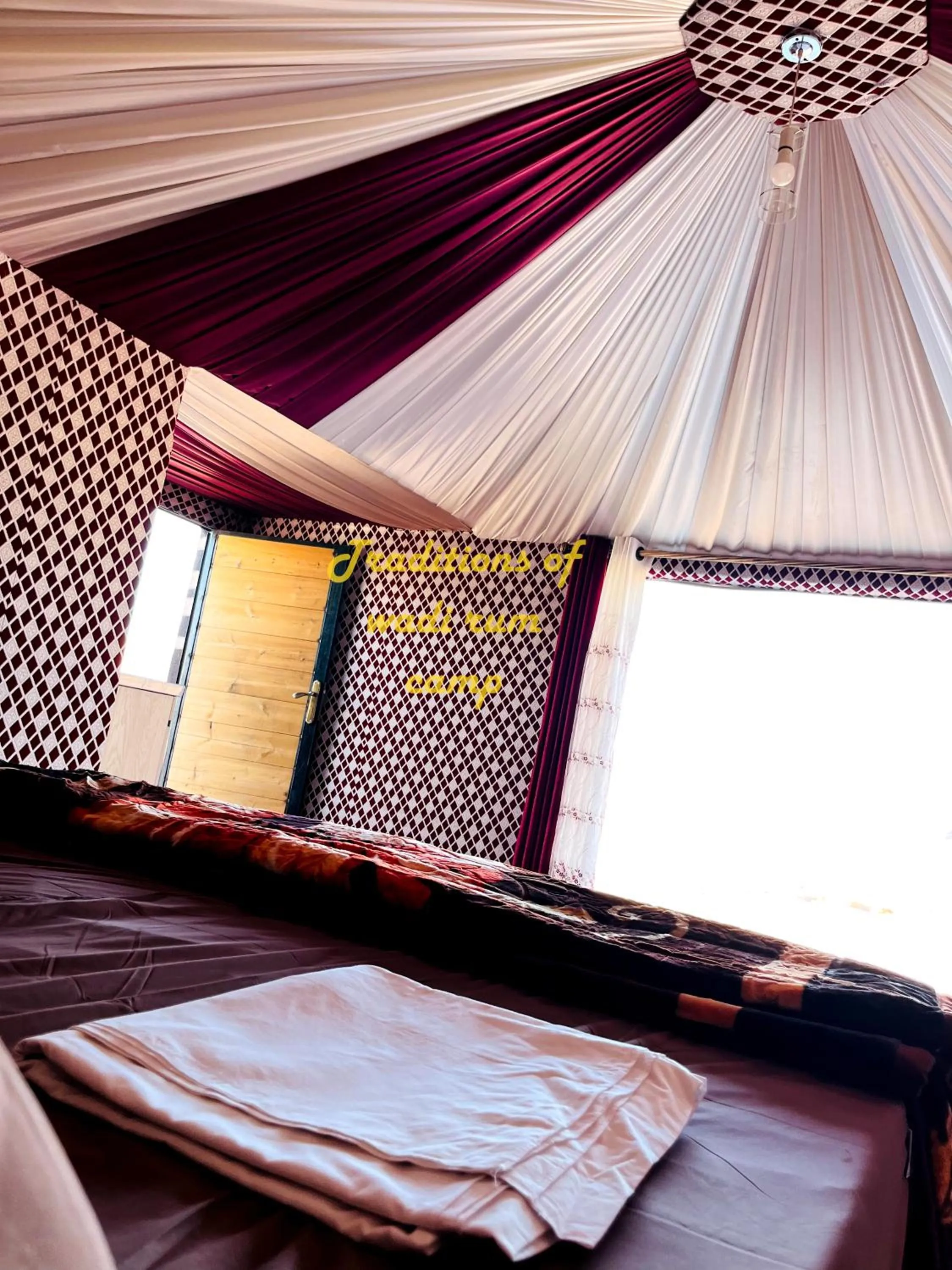 Bed in Traditions of Wadi Rum camp & jeep tour