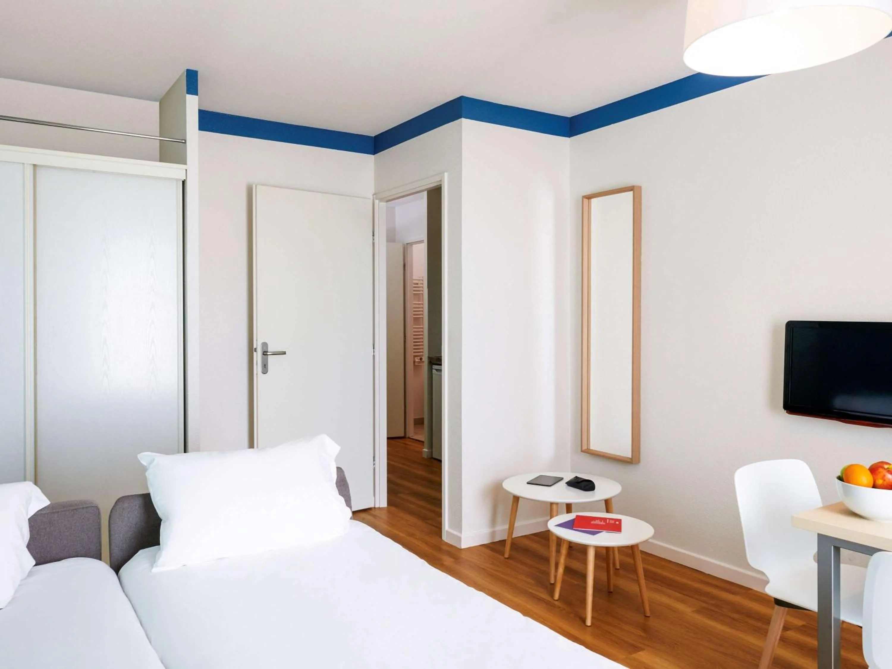 Photo of the whole room, Bed in Aparthotel Adagio Access Strasbourg Illkirch