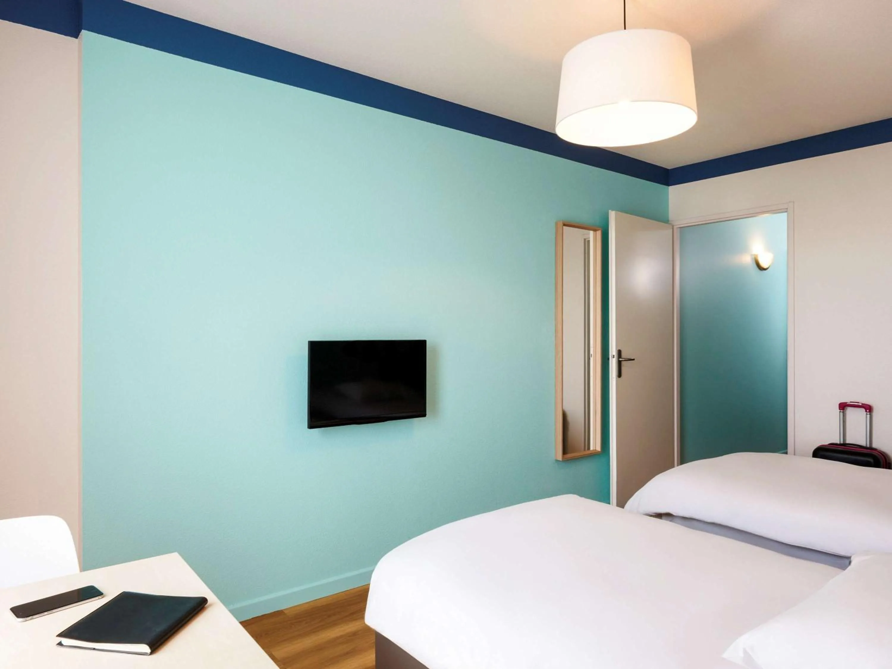Photo of the whole room, Bed in Aparthotel Adagio Access Strasbourg Illkirch