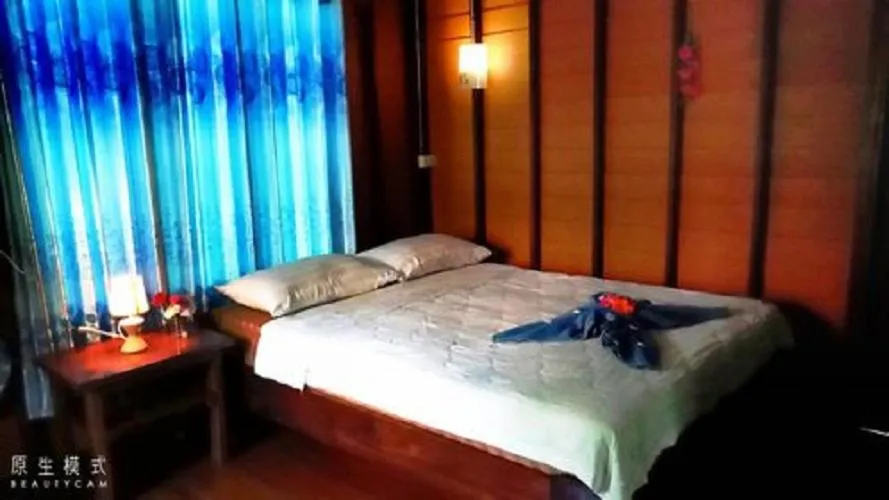 Bed in Najjamee Bungalows