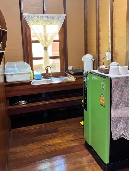 Kitchen or kitchenette in Najjamee Bungalows