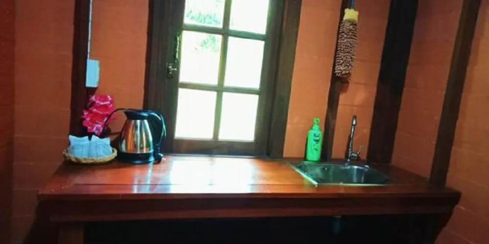 Kitchen or kitchenette in Najjamee Bungalows