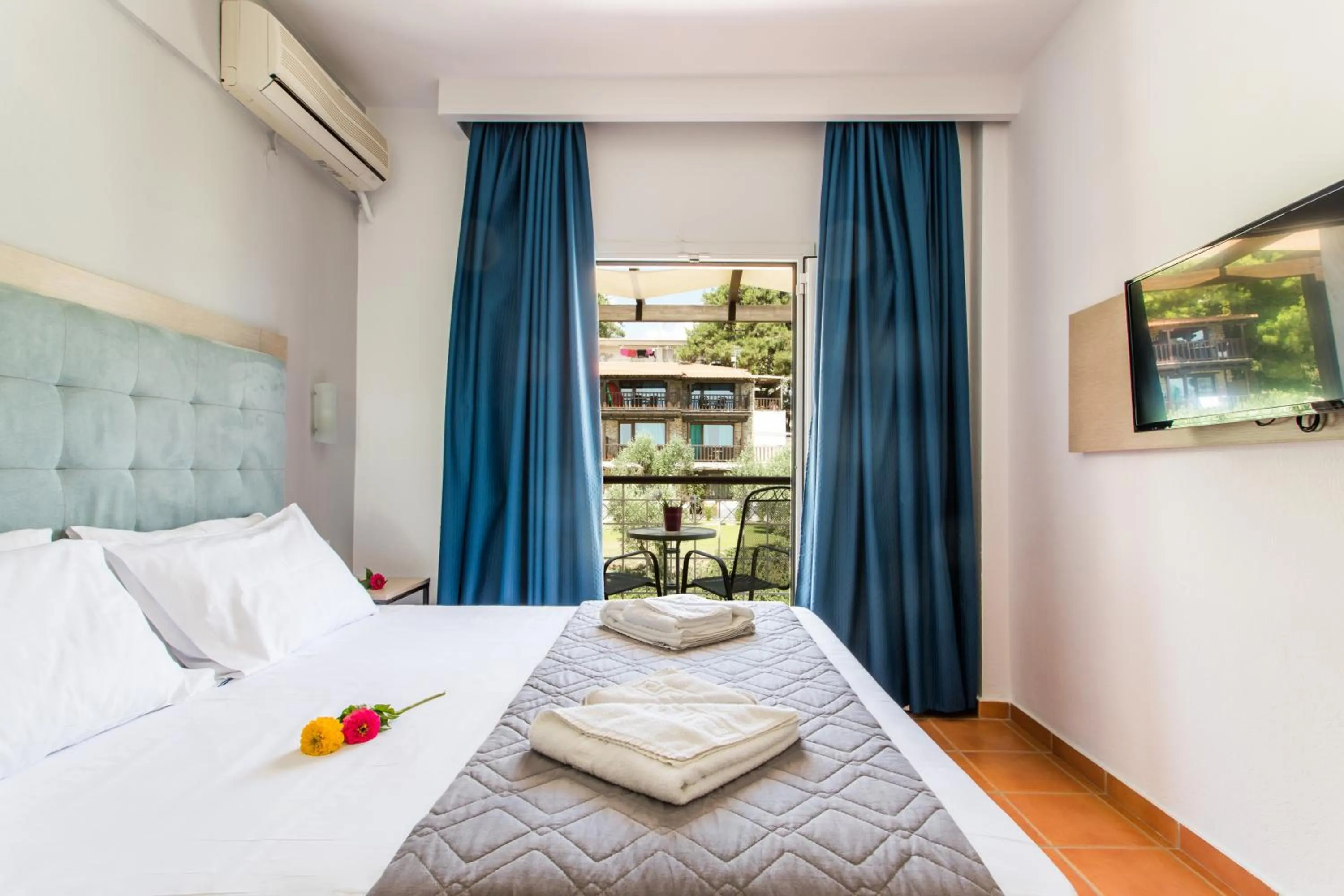 Photo of the whole room in Coral Blue Beach Hotel Gerakini