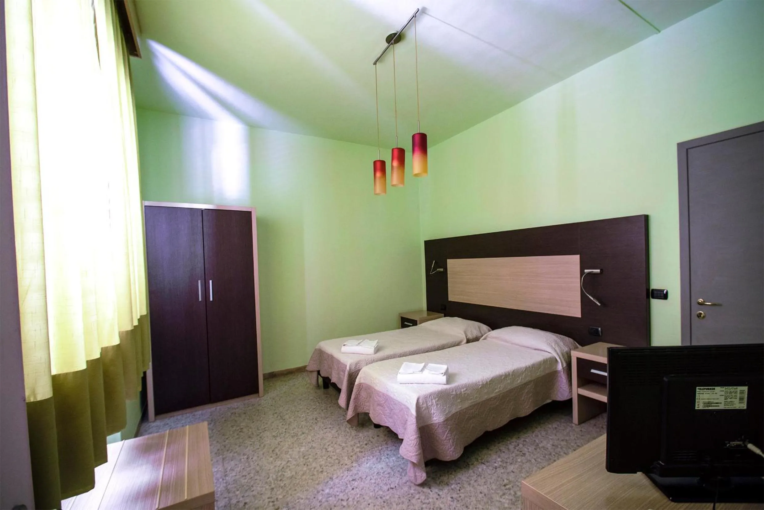 Bed in Hotel Sabatino