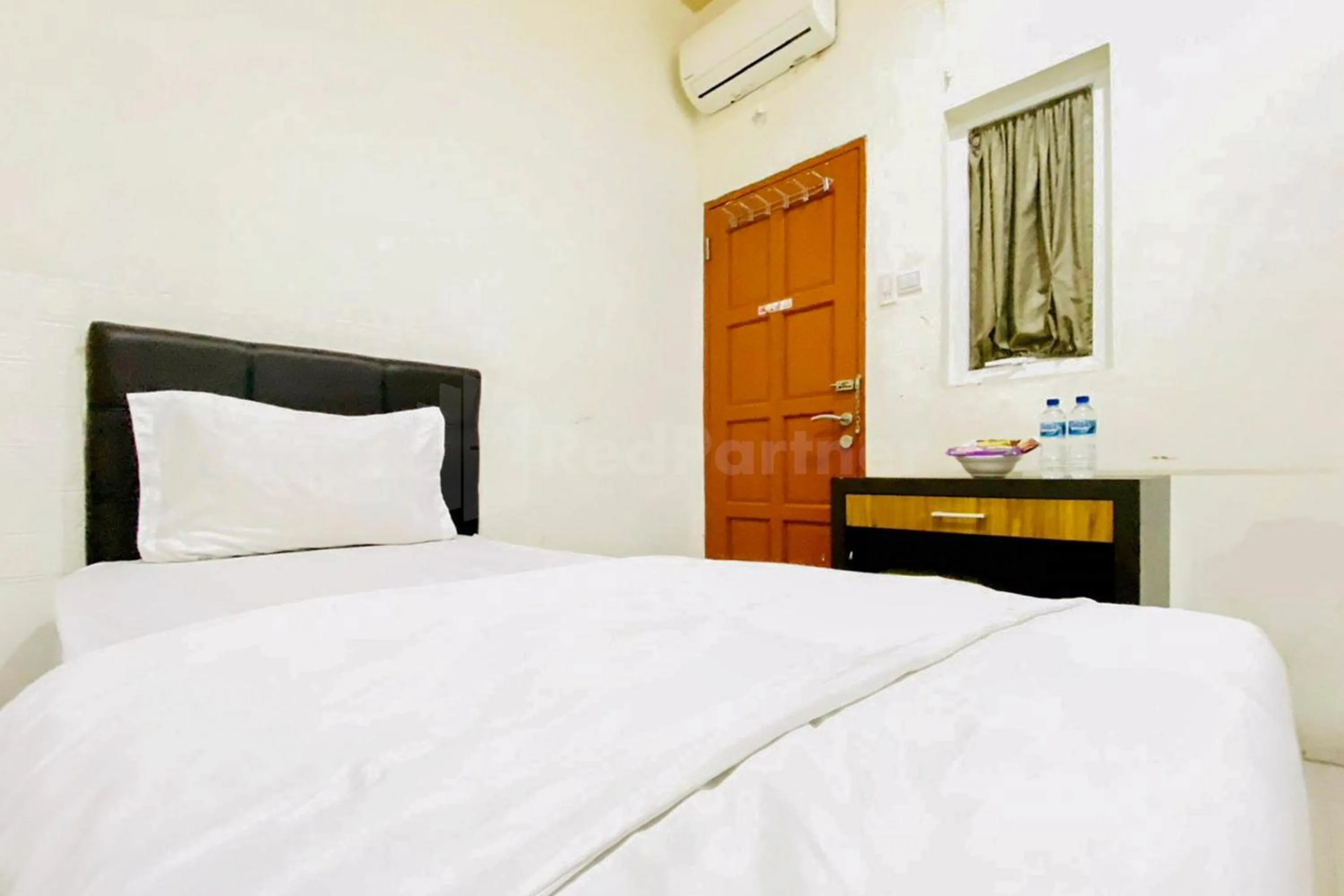 Bed in Palem Mas Garden RedPartner