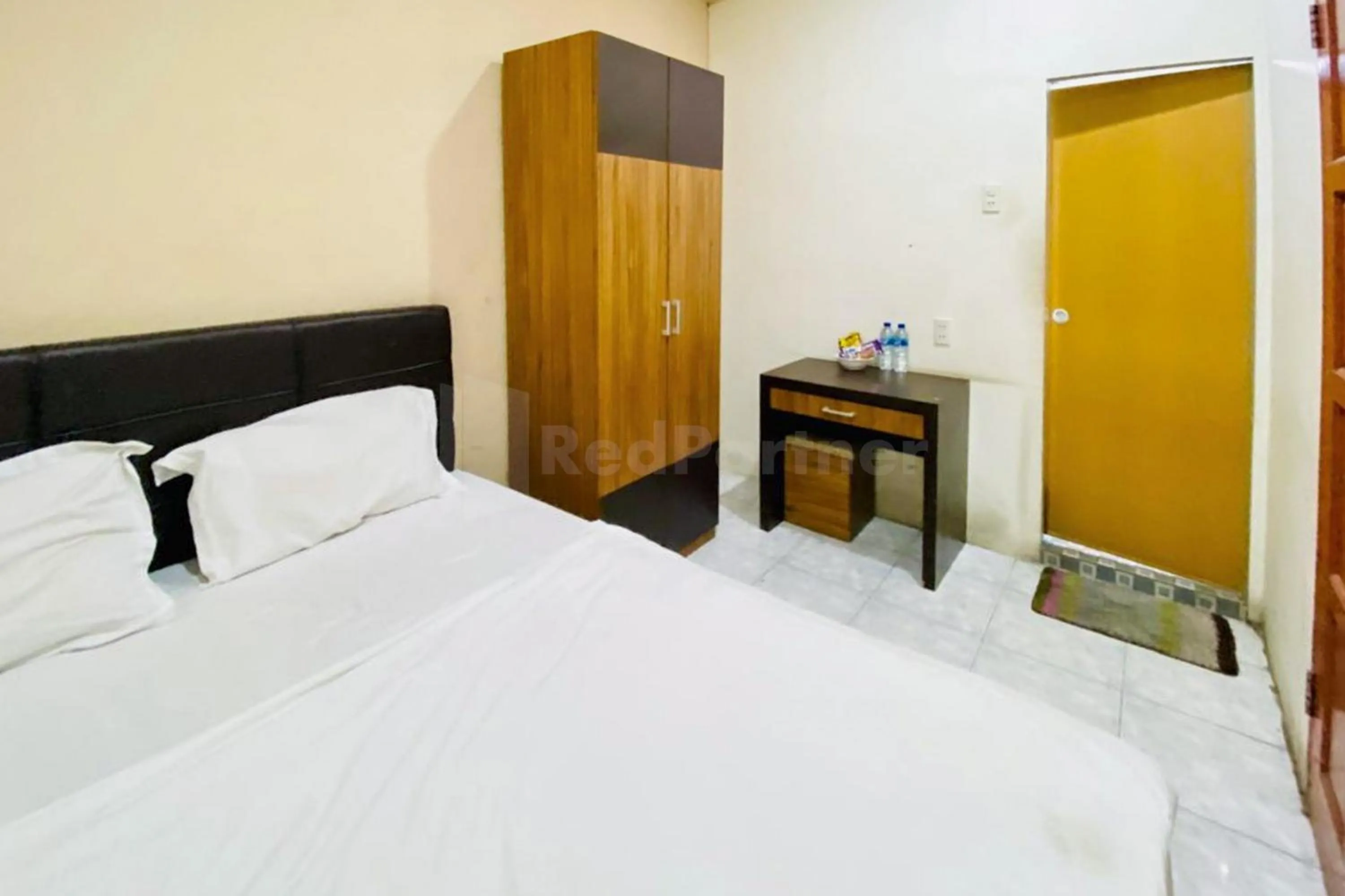 Bed in Palem Mas Garden RedPartner