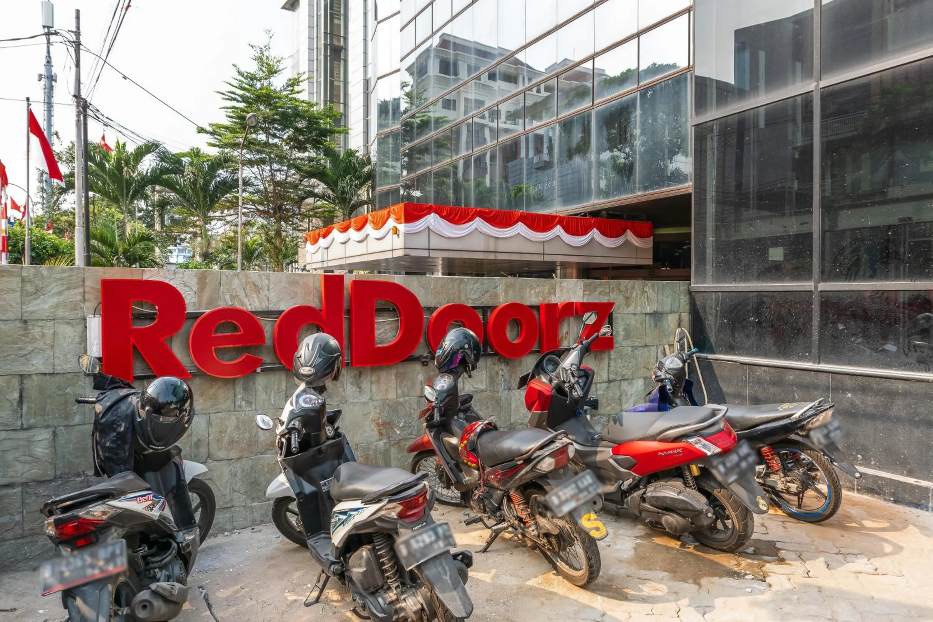 Facade/entrance in RedDoorz Plus near Taman Ismail Marzuki