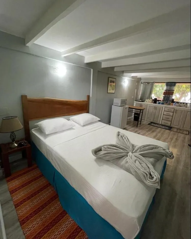 Bed in Castara Inn