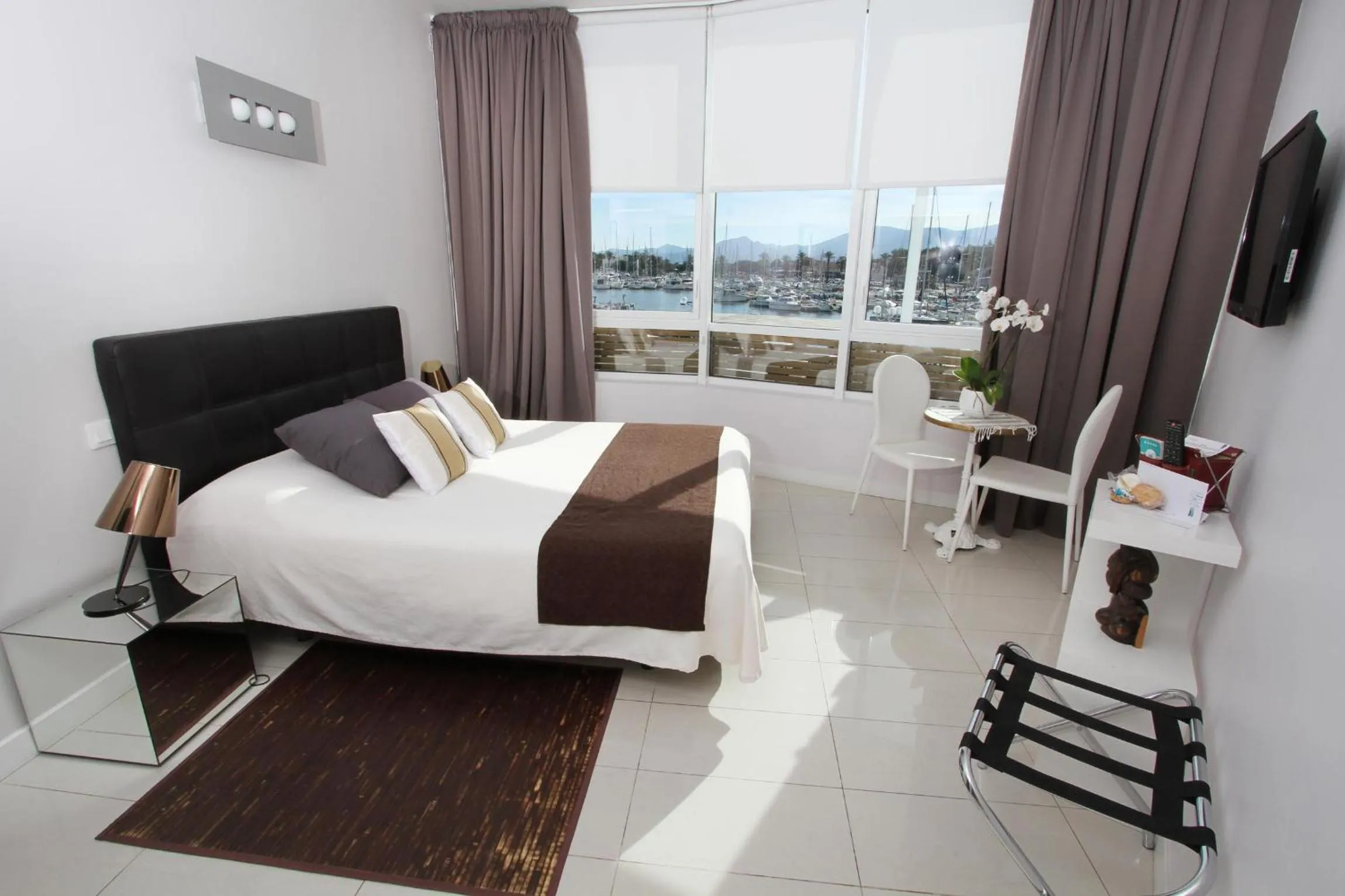 View (from property/room), Bed in Bleu Mer Duplex & Suites