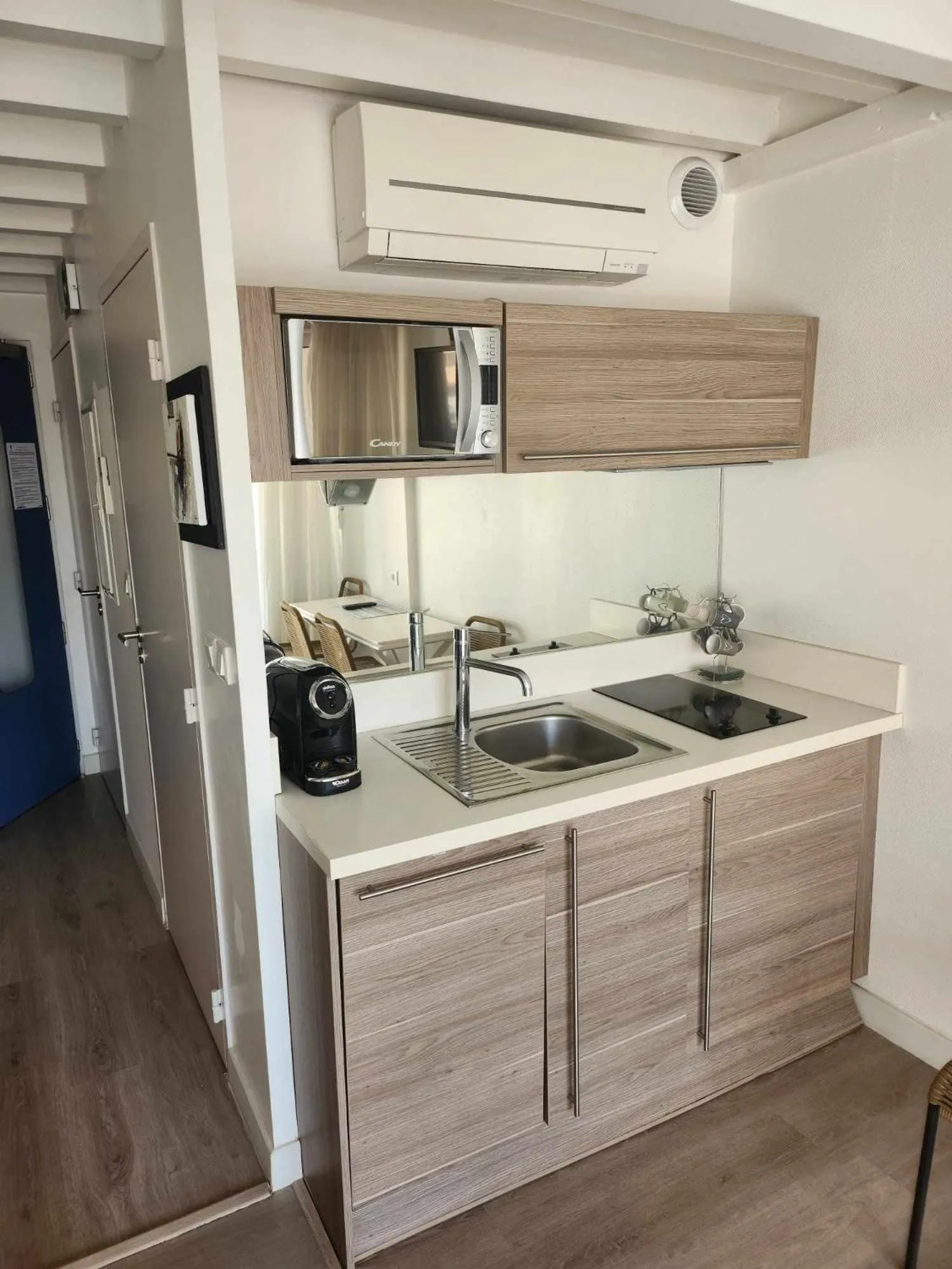 Kitchen or kitchenette in Bleu Mer Duplex & Suites