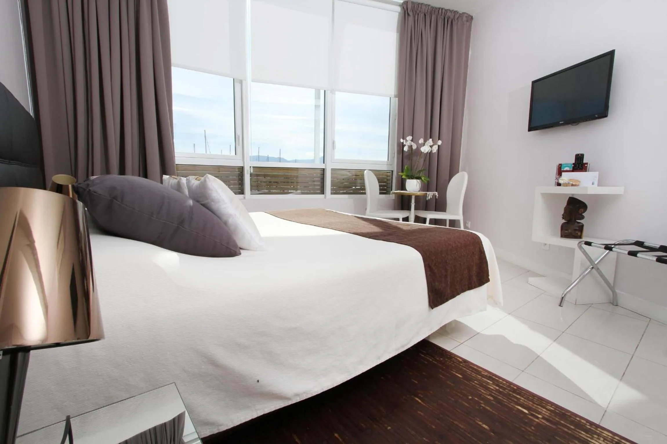 Photo of the whole room, Bed in Bleu Mer Duplex & Suites