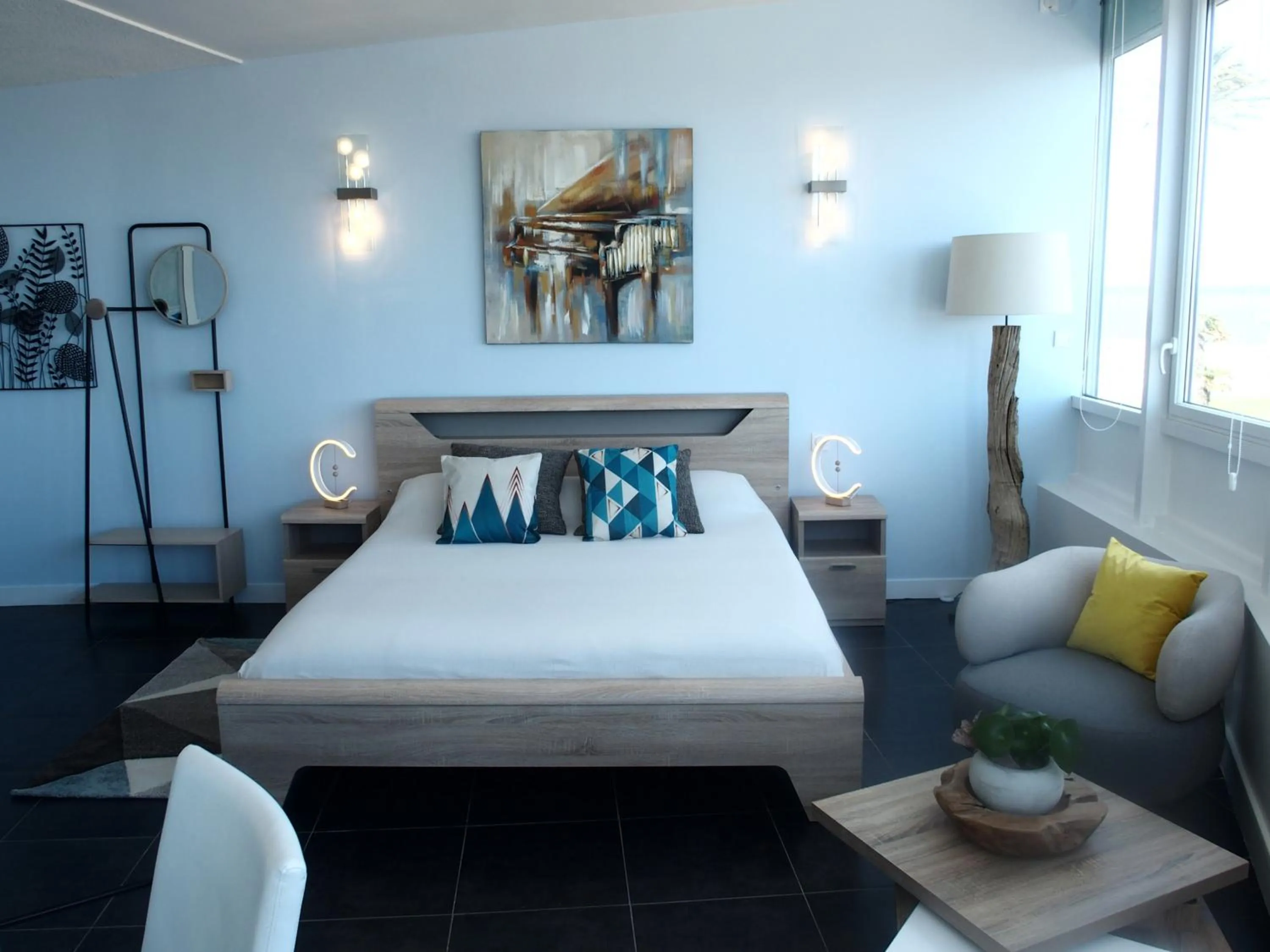 Bed in Bleu Mer Duplex & Suites