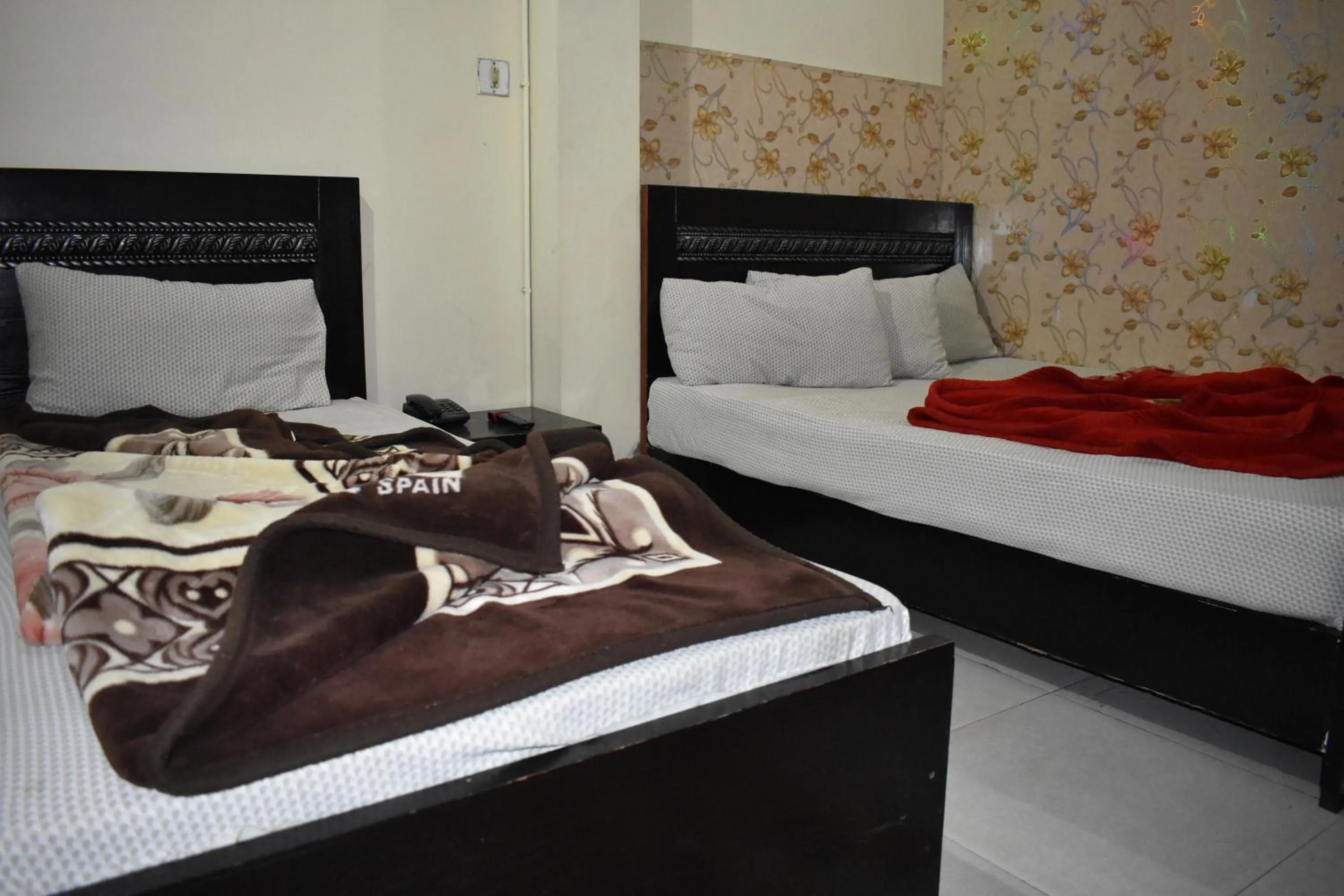 Bed in Hotel Islamabad Metro Inn