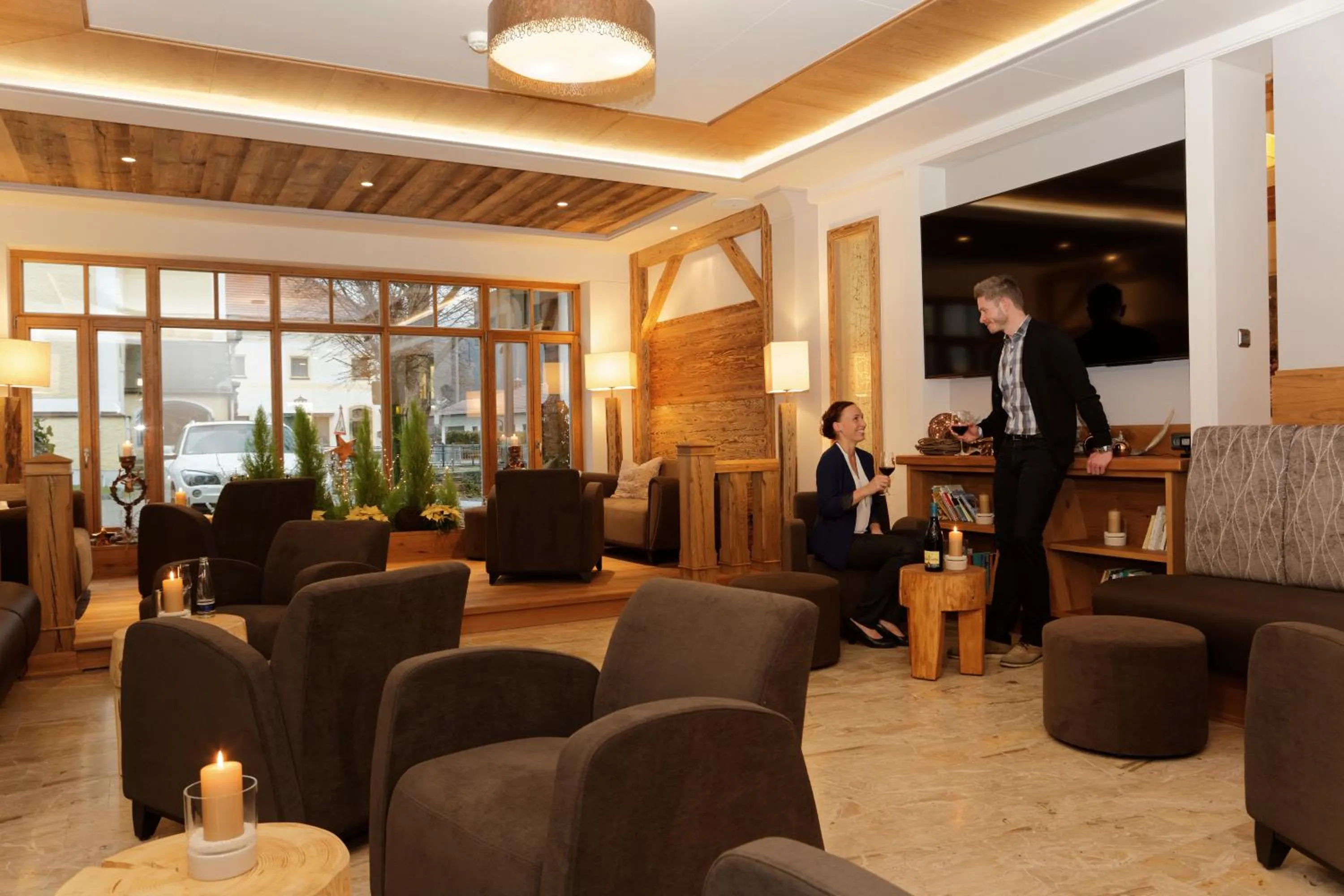 Communal lounge/ TV room in Wellnesshotel Hofbräuhaus