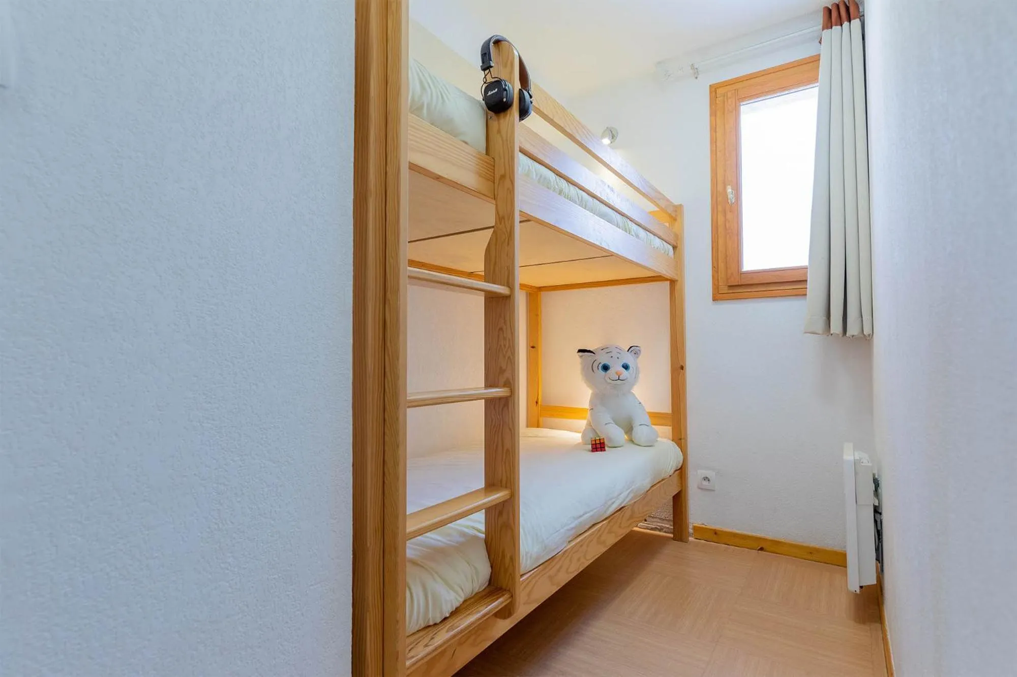 Bed in Madame Vacances Résidence Le Parc Des Airelles