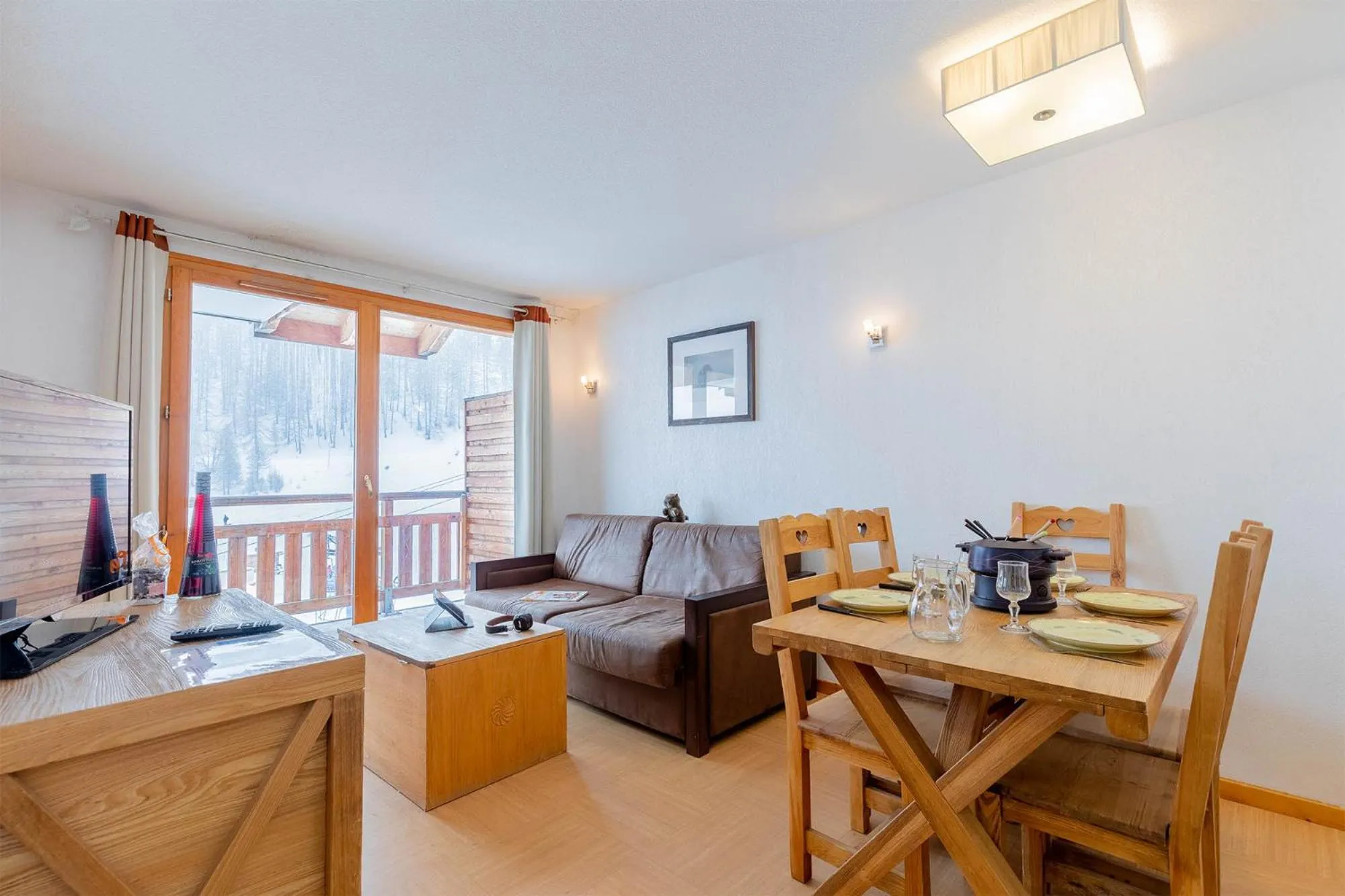 Living room in Madame Vacances Résidence Le Parc Des Airelles