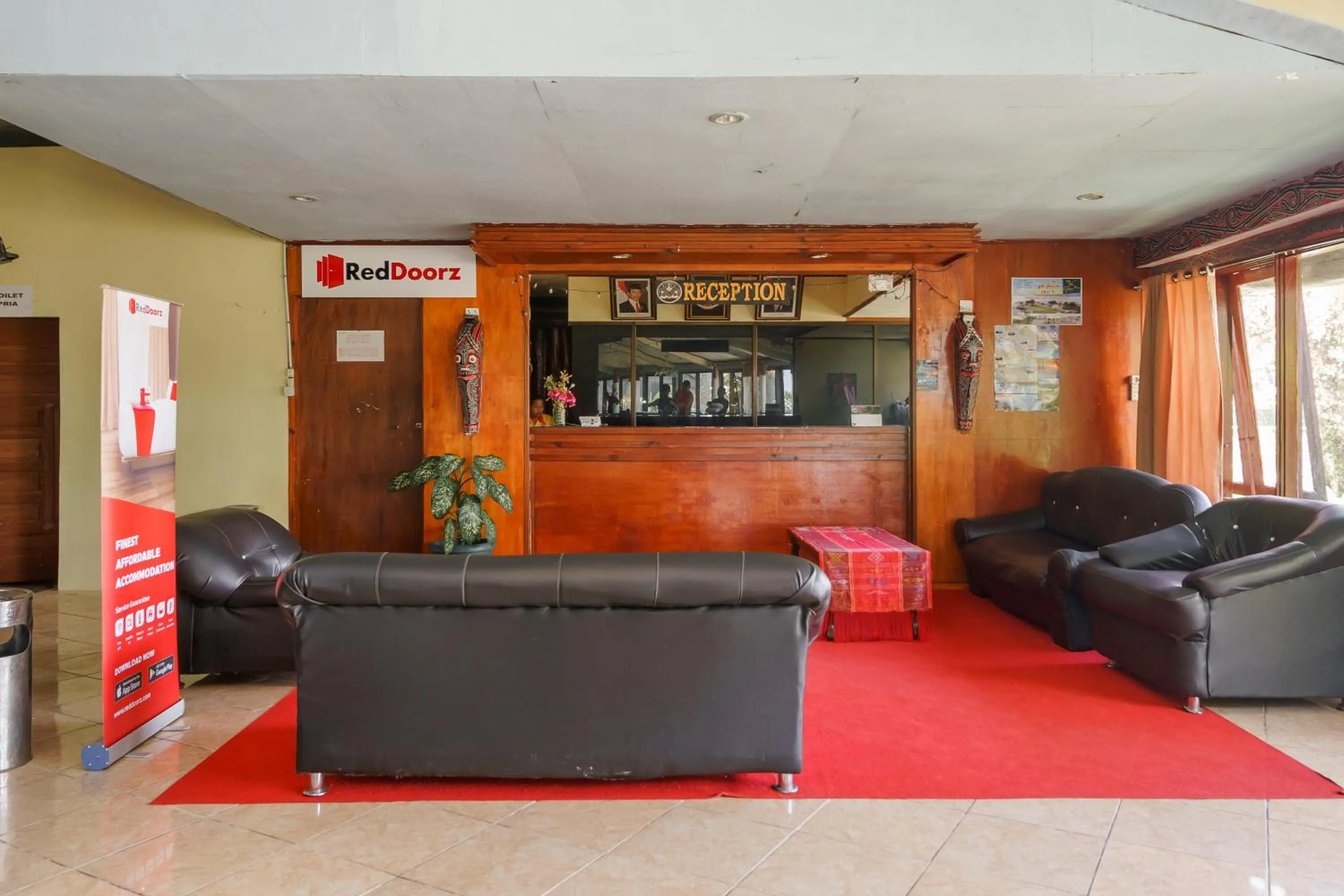 Living room in RedDoorz @ Tuktuk Danau Toba