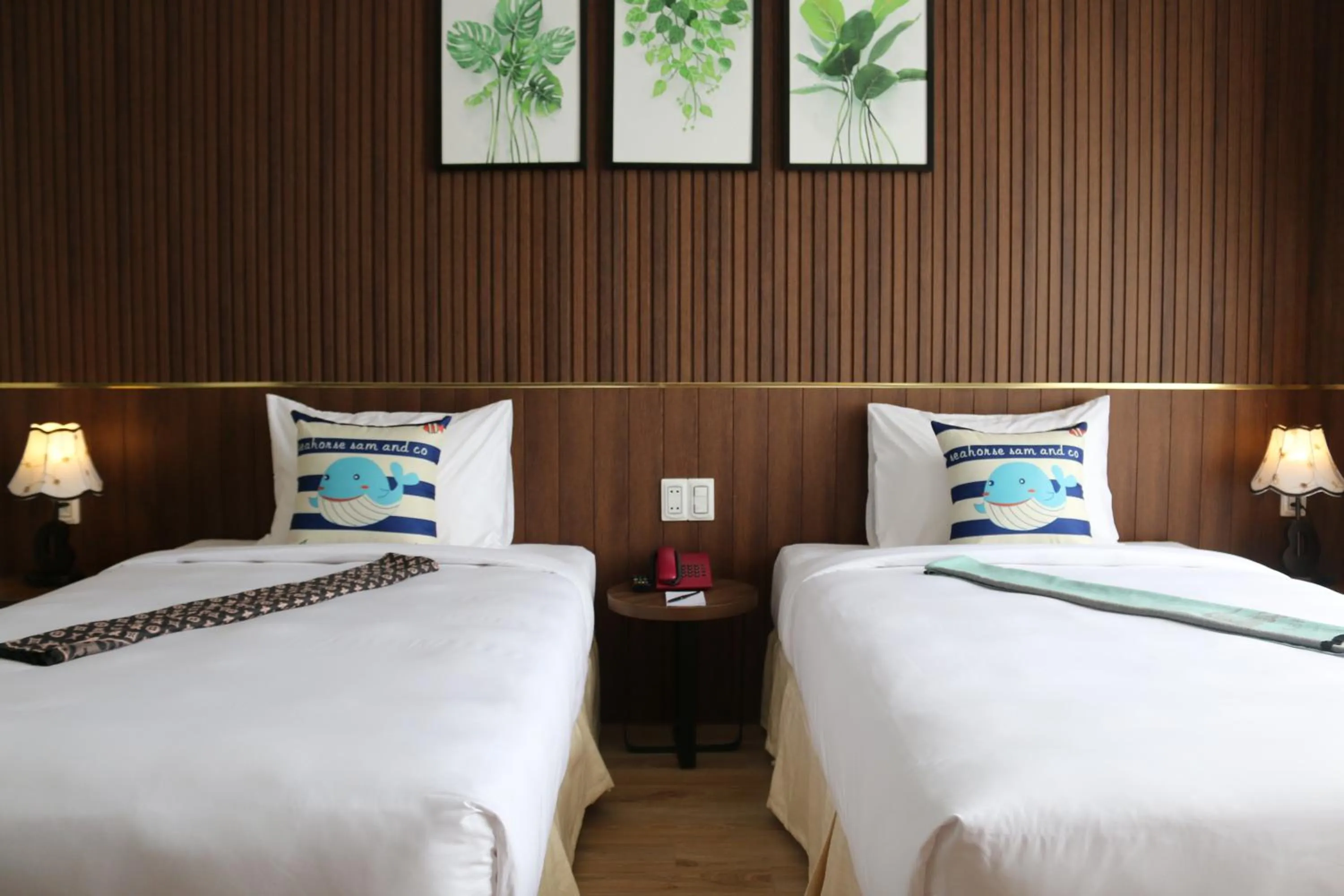 Bed in The Fish Village Villa