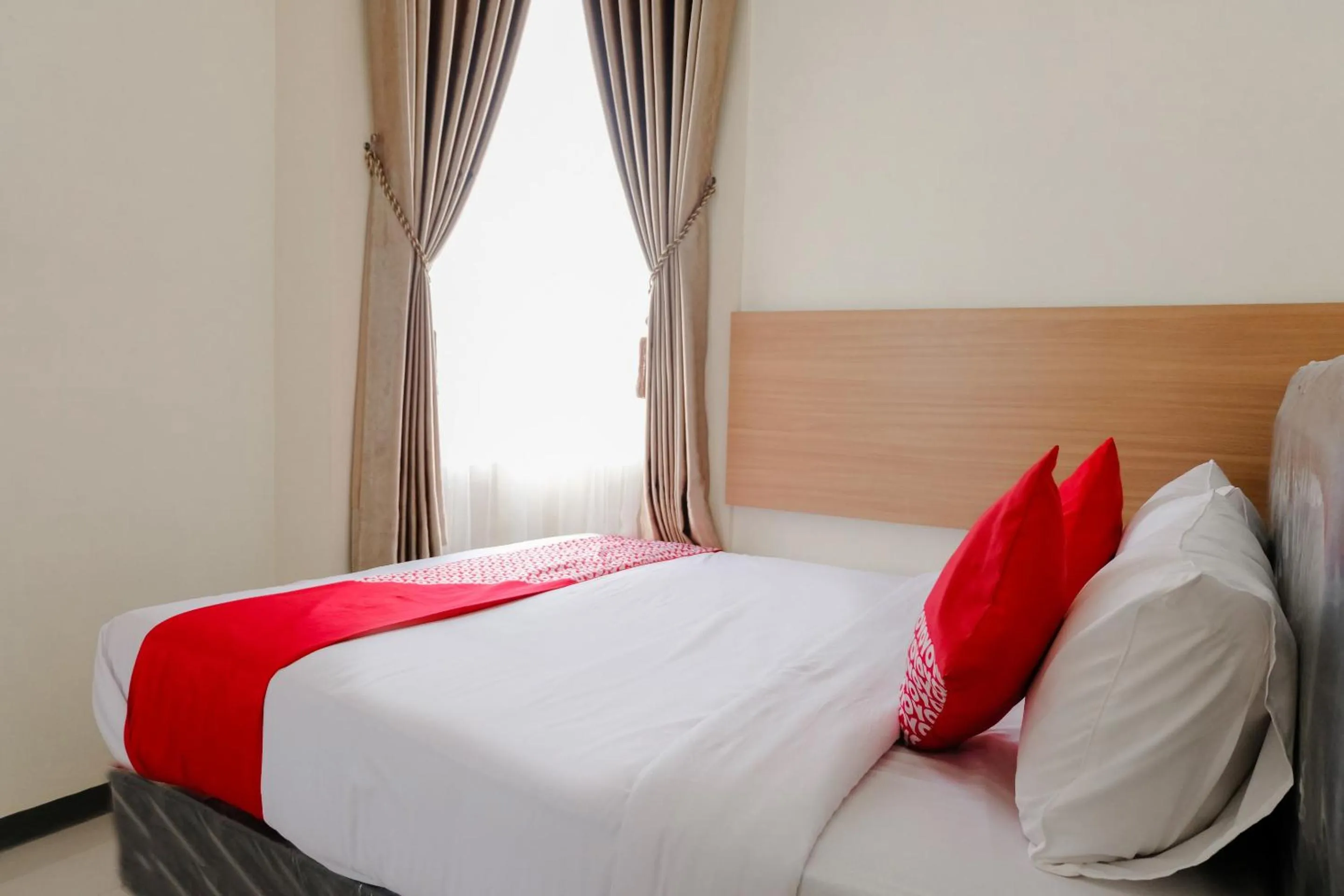 Bedroom in OYO Flagship 1603 Antosa Family Residence Silver Key