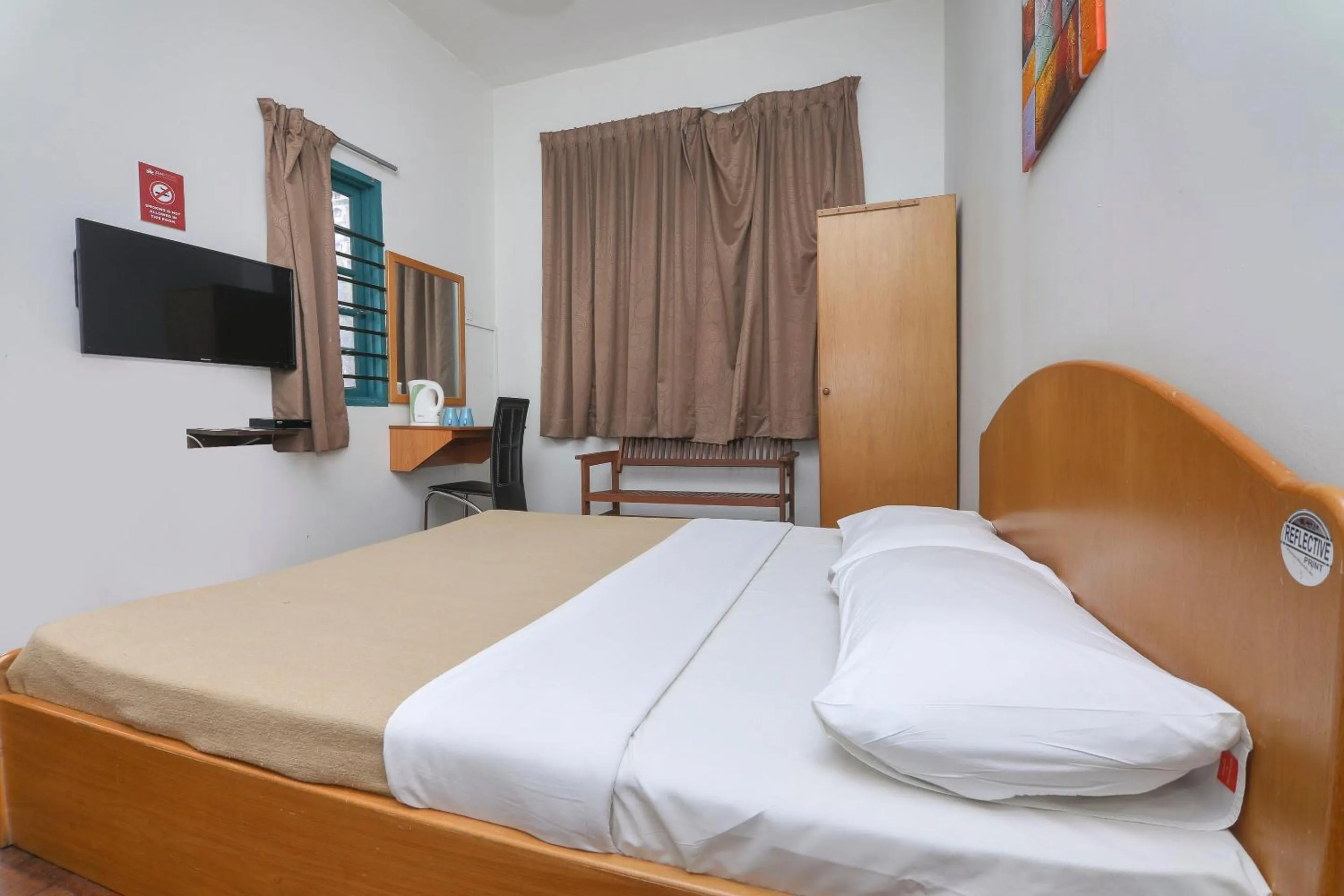 Bedroom, Bed in SPOT ON 89789 Hotel Check In 2