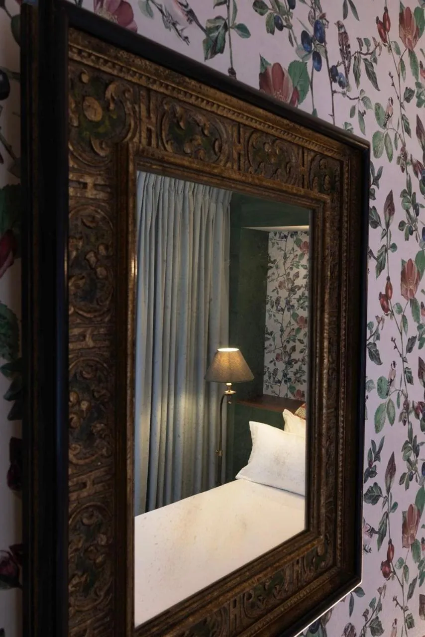 Bed in Hotel L de Lutece - Notre-Dame