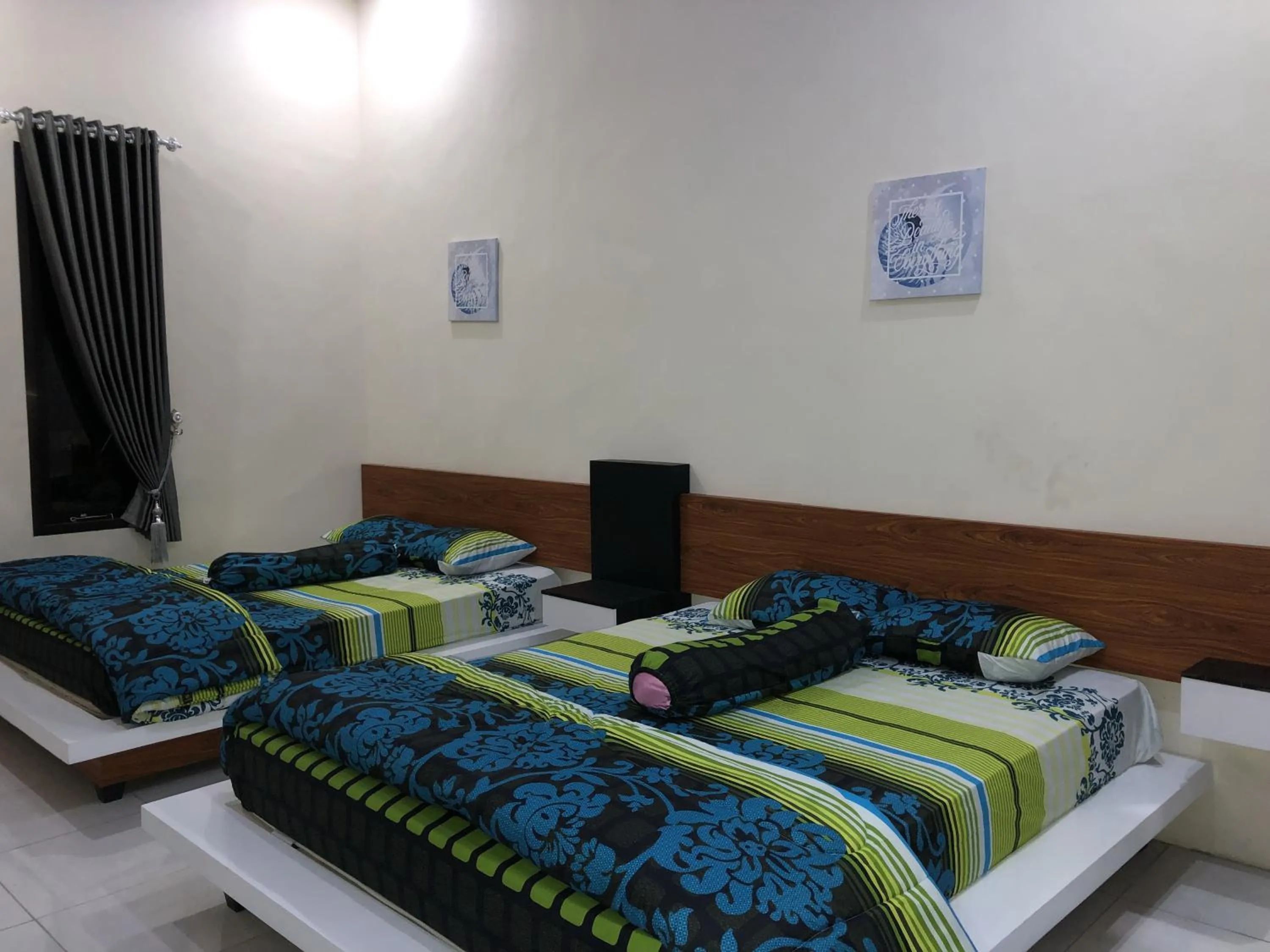Photo of the whole room, Bed in Rumah Singgah BRM