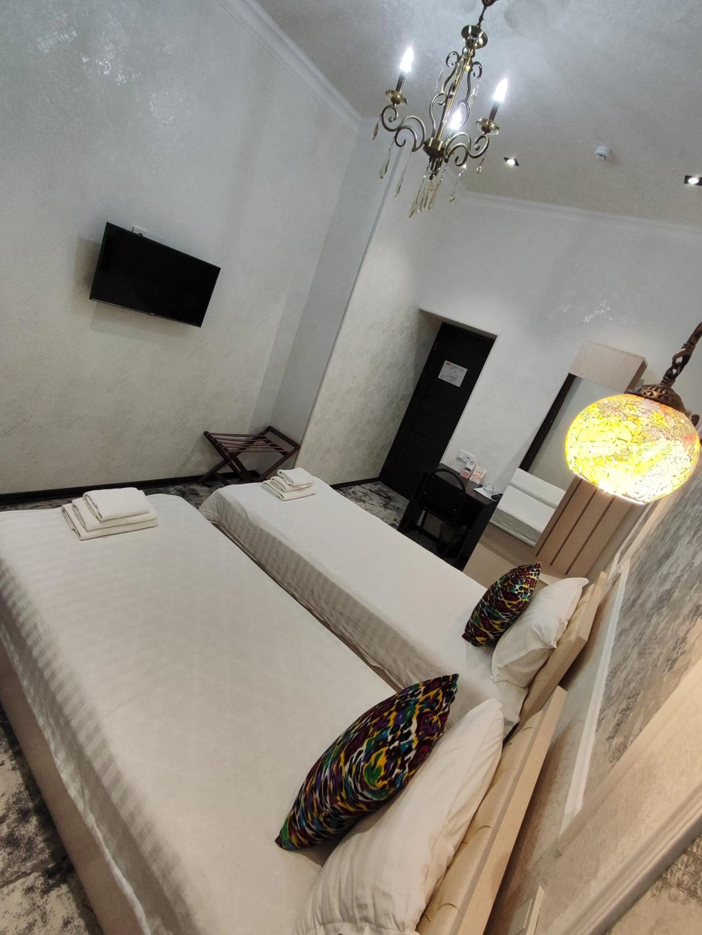 Photo of the whole room, Bed in Hotel Suzani Samarkand