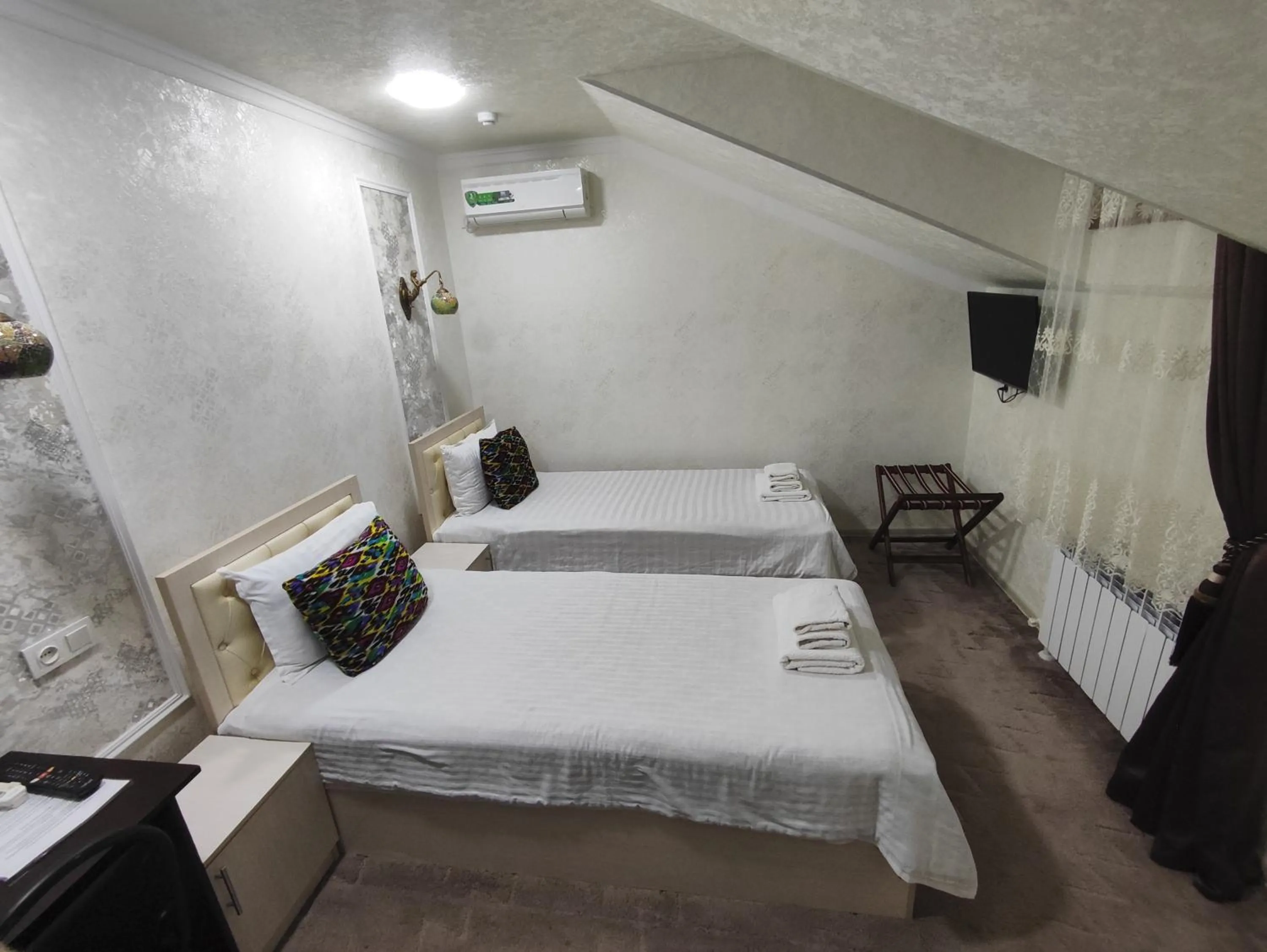 Photo of the whole room, Bed in Hotel Suzani Samarkand