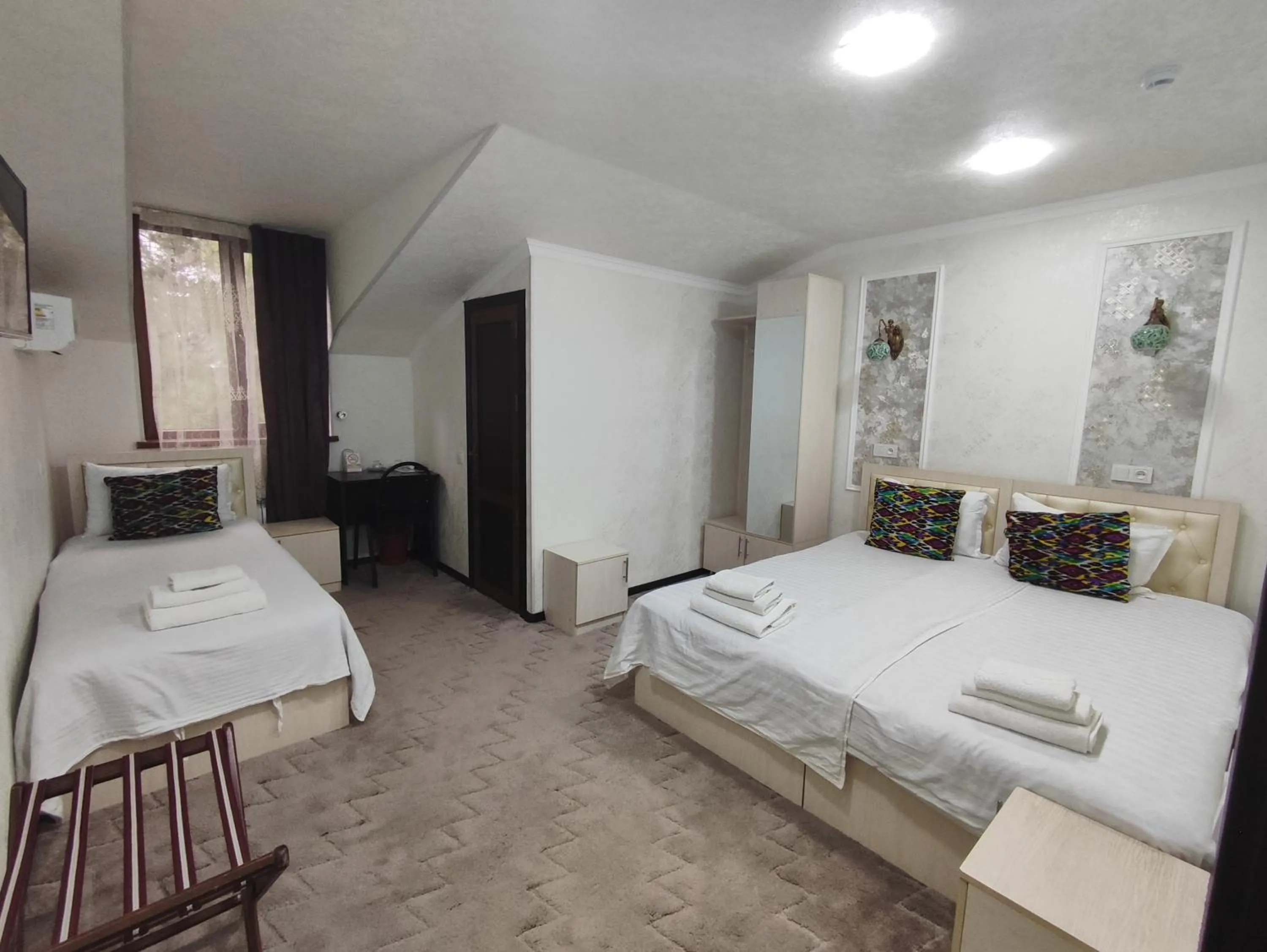 Photo of the whole room, Bed in Hotel Suzani Samarkand