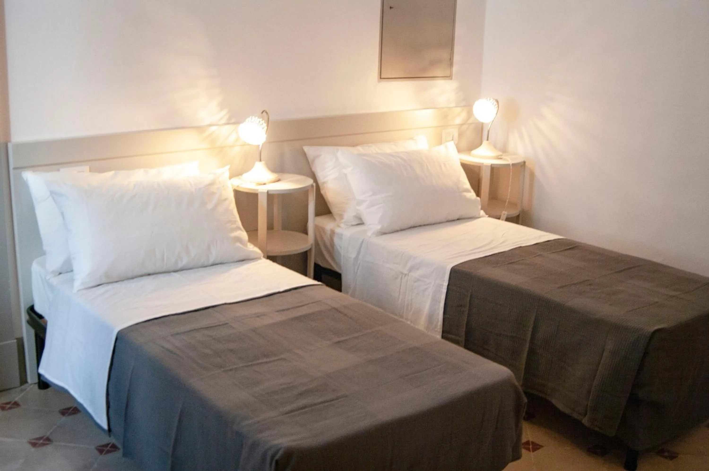 Bed in Le Finestre Su Porta Carrese - Luxury Rooms