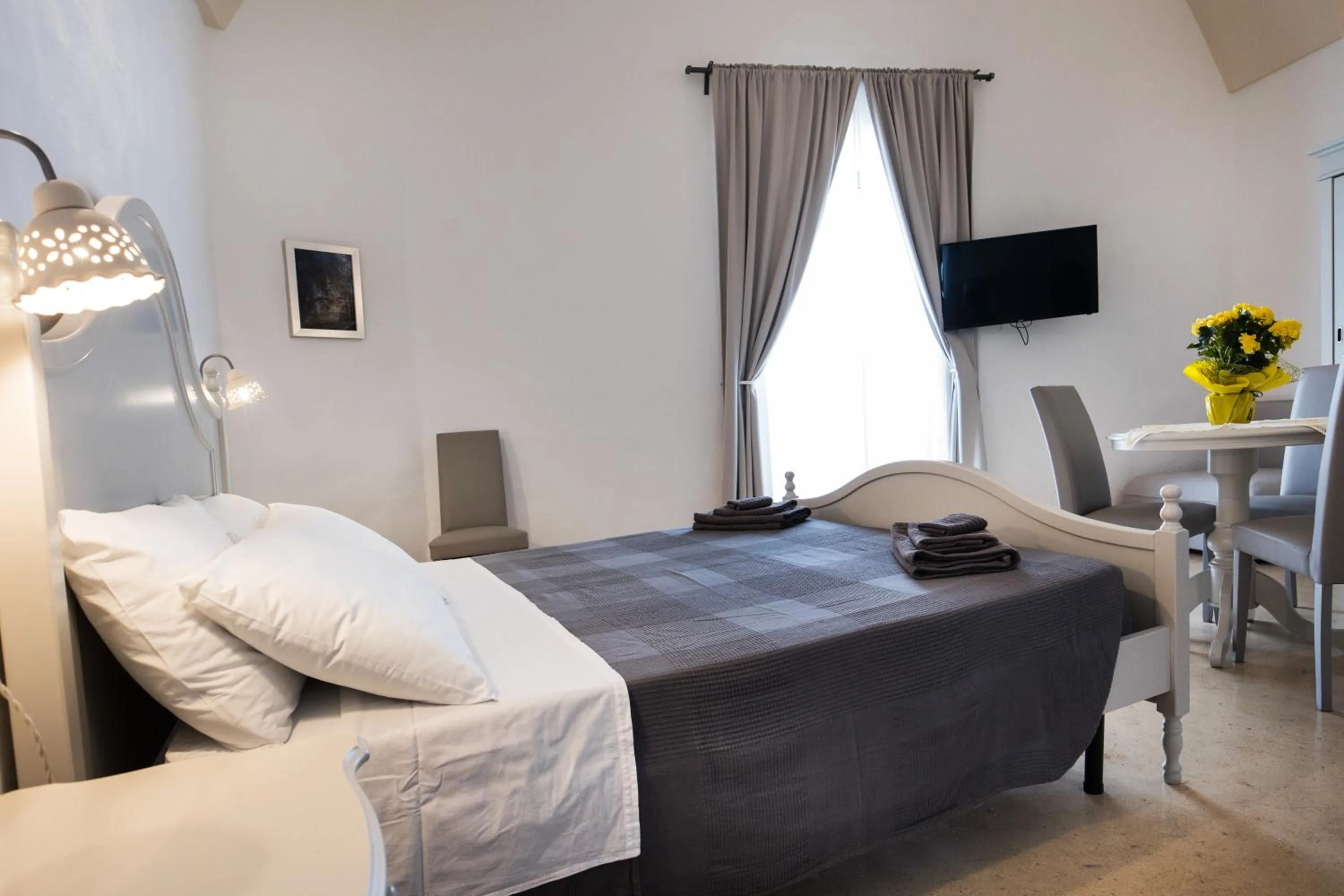 Bed in Le Finestre Su Porta Carrese - Luxury Rooms