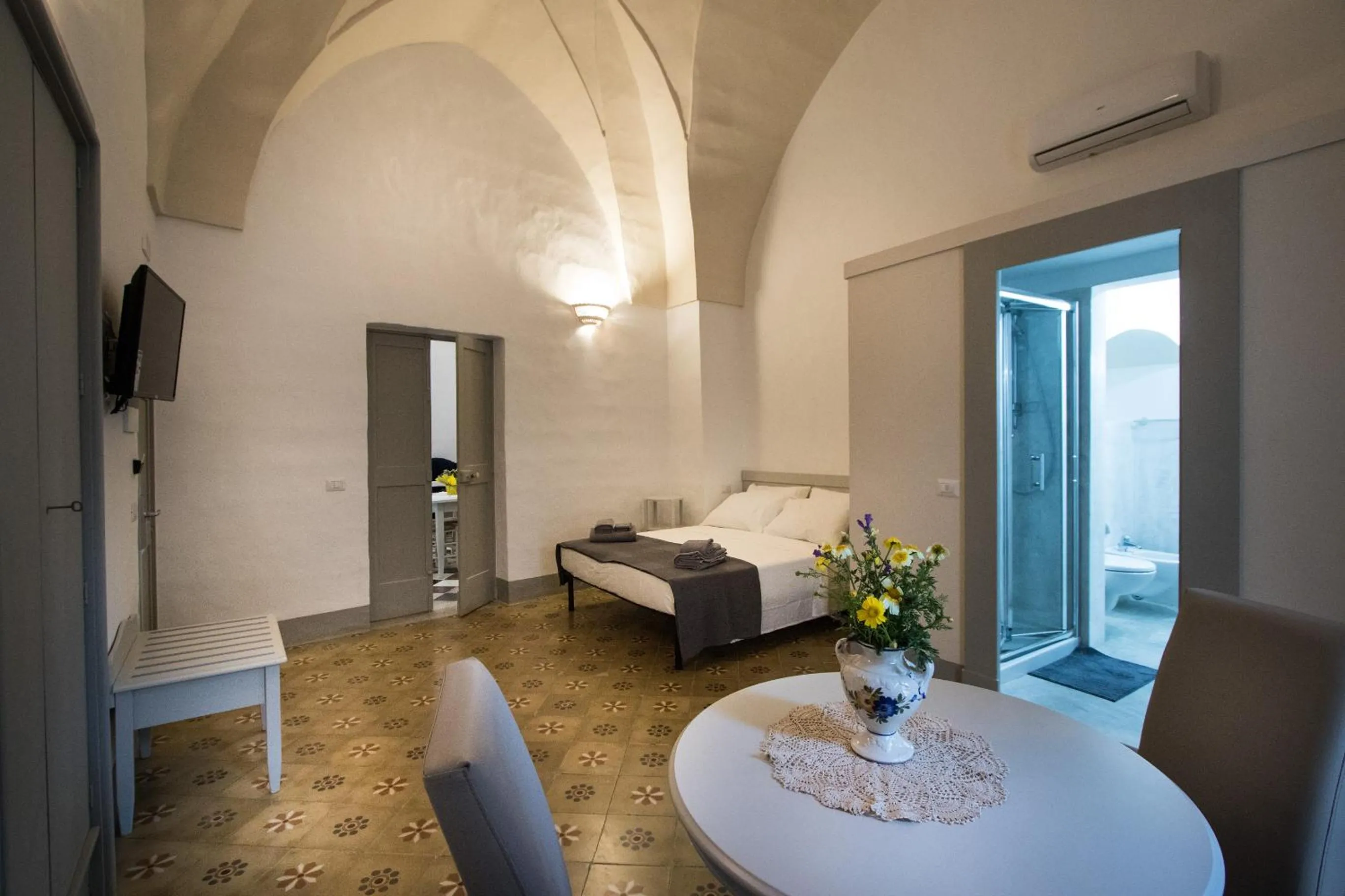 TV and multimedia in Le Finestre Su Porta Carrese - Luxury Rooms