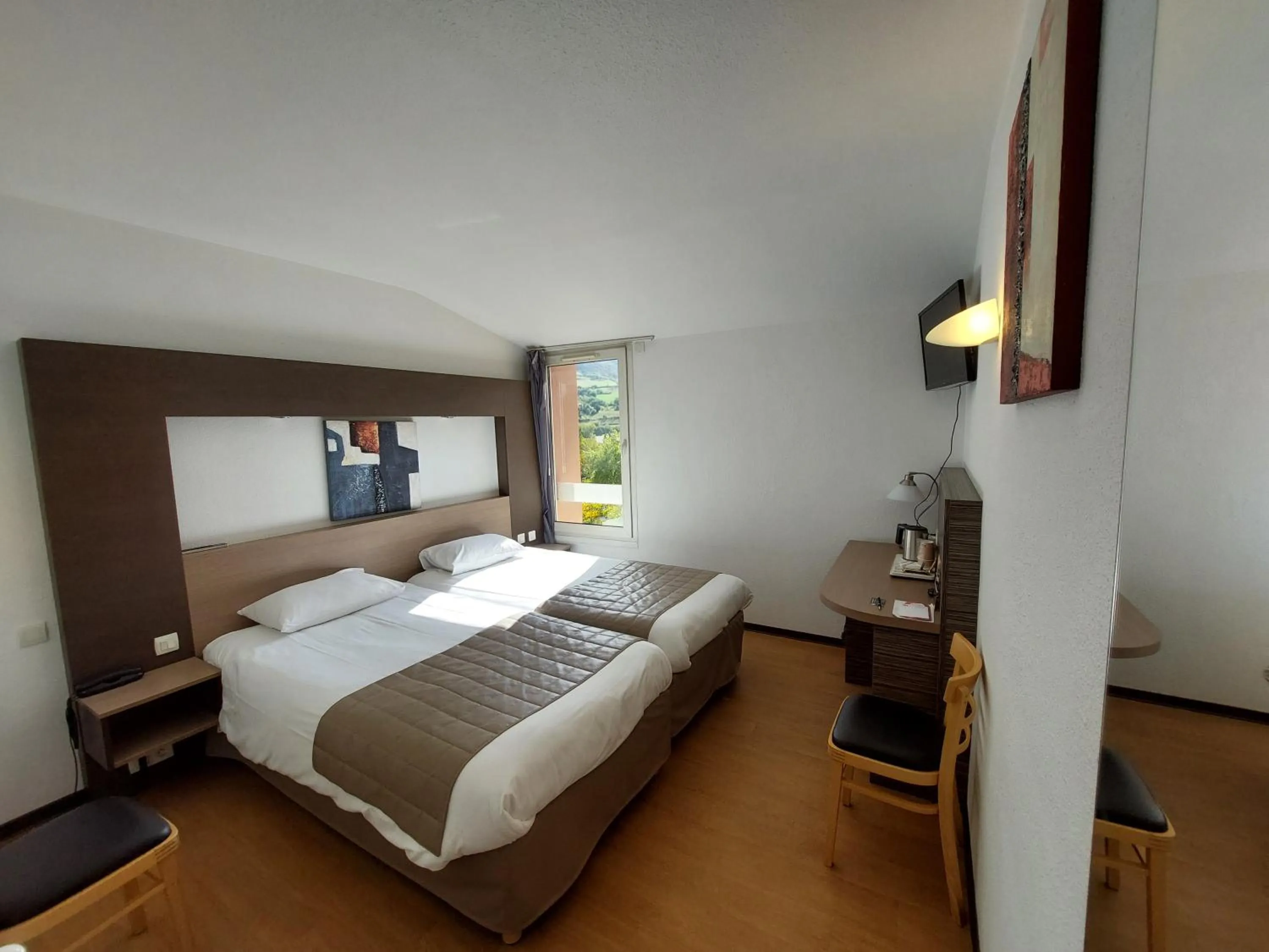 Bed in Cévenol Hôtel