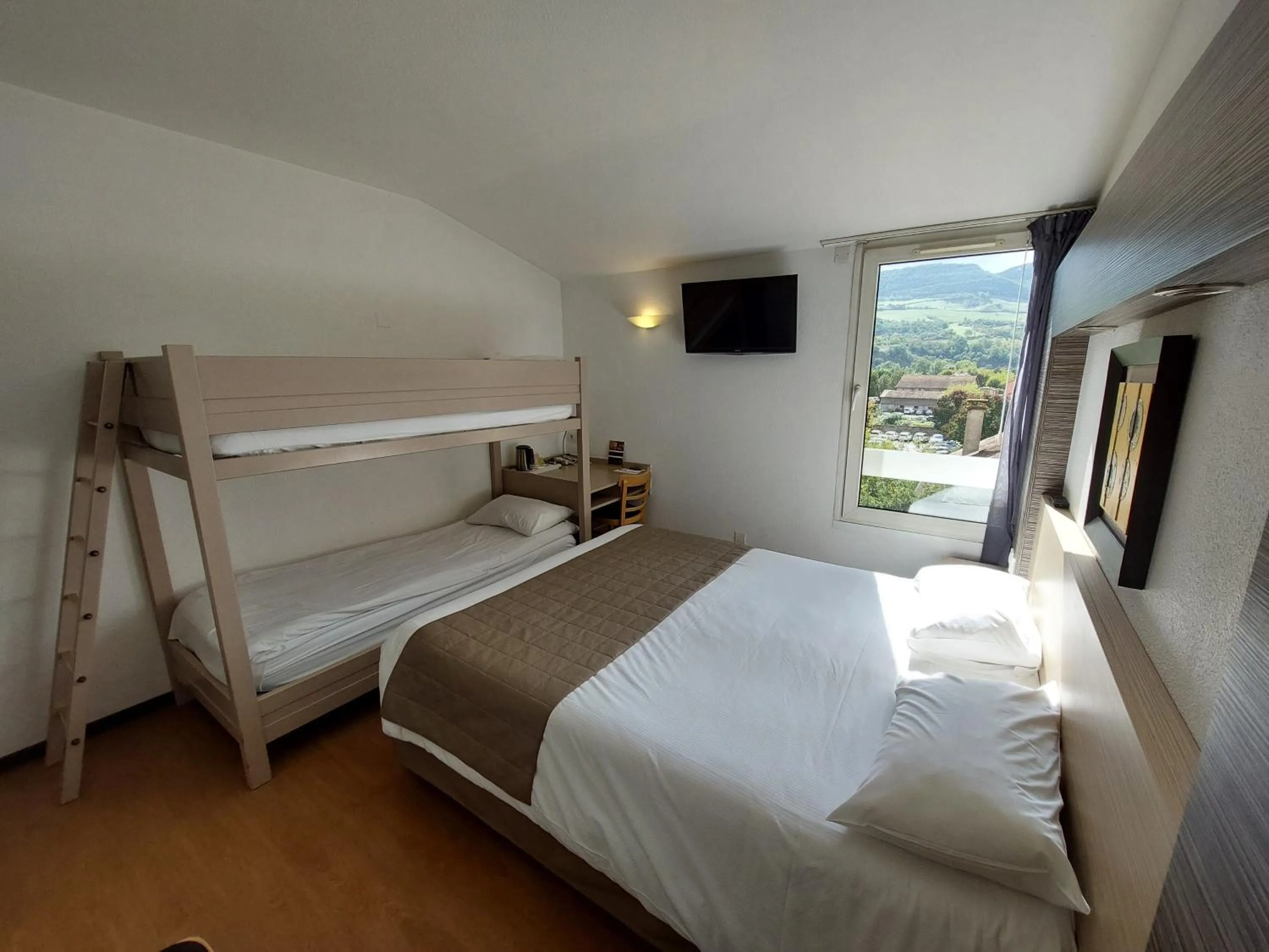 Bed in Cévenol Hôtel