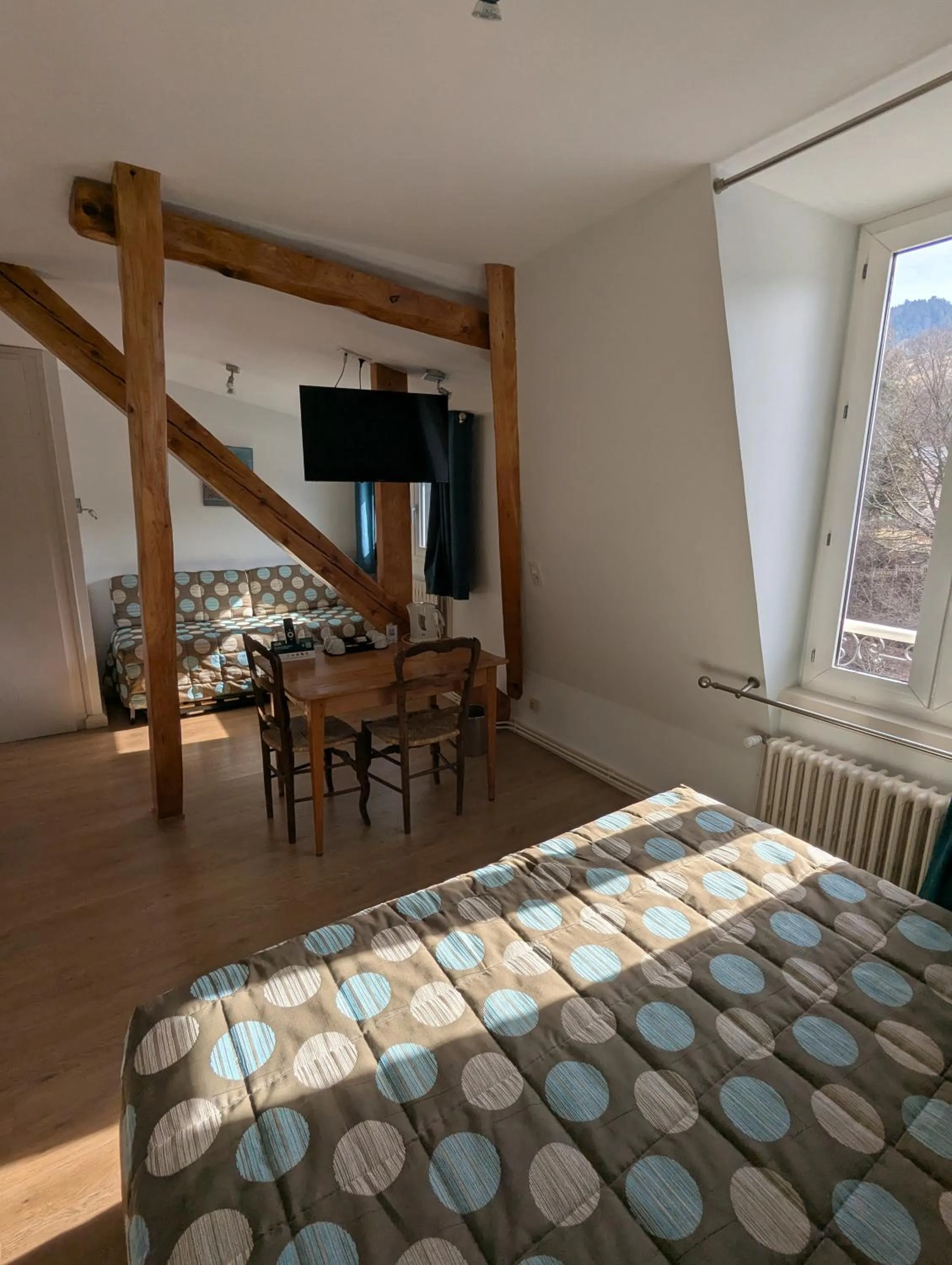 Bedroom, Bed in Logis Hôtel Regina