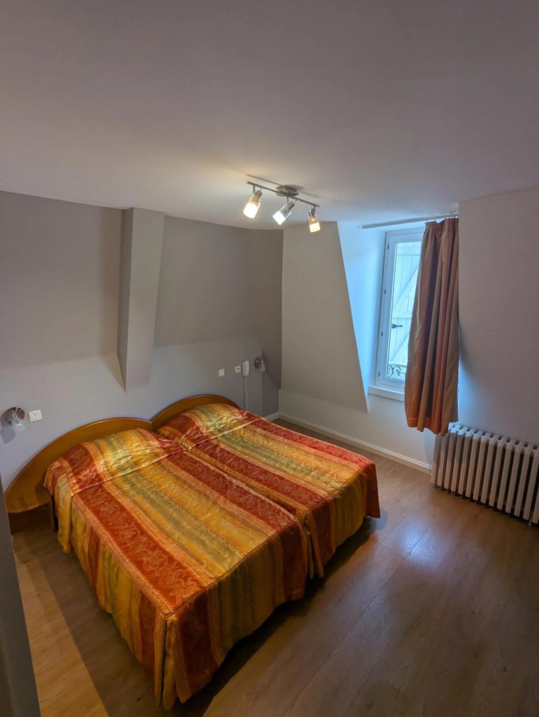 Bedroom, Bed in Logis Hôtel Regina