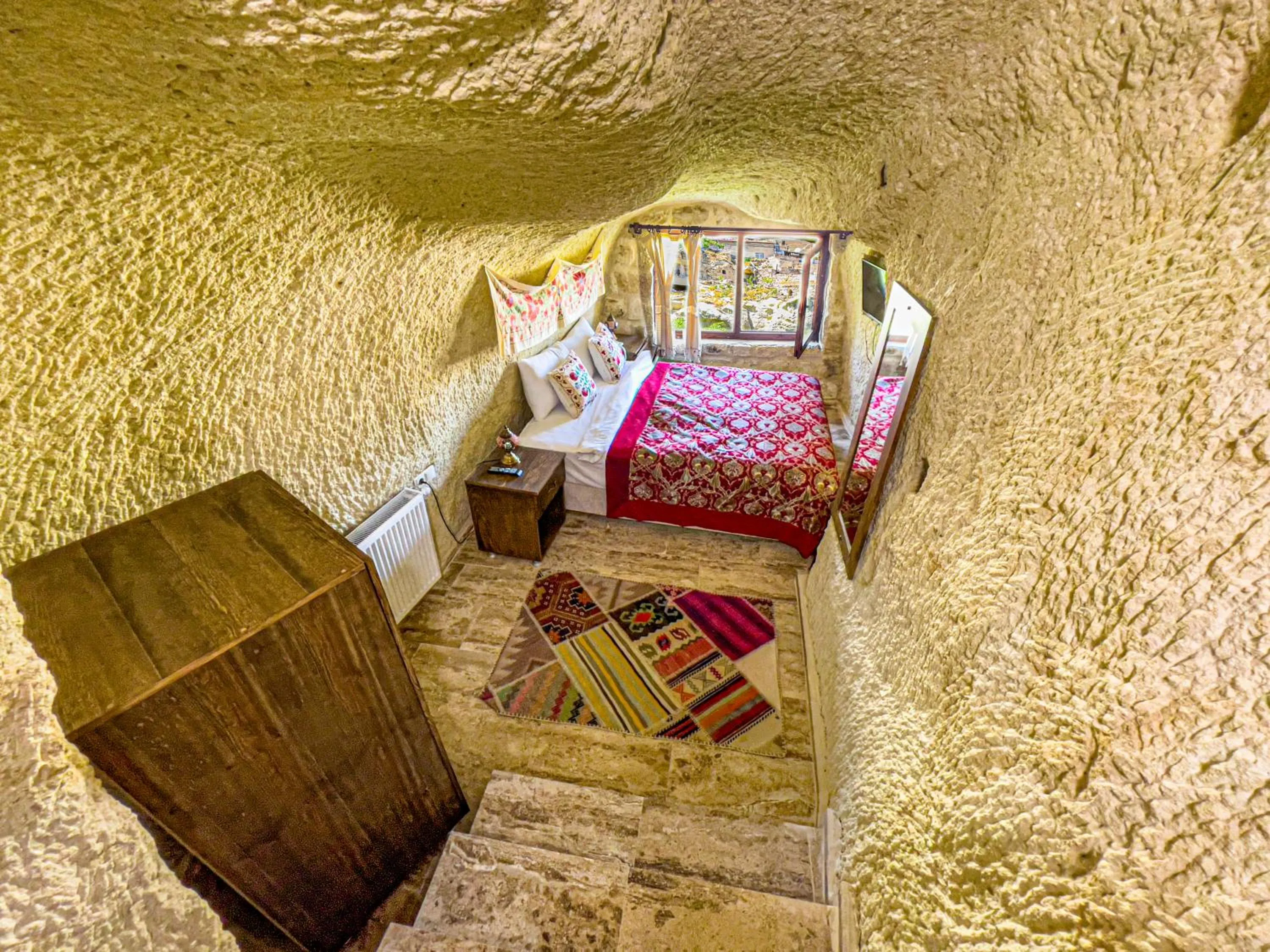 Bed in Heritage Cave Suites