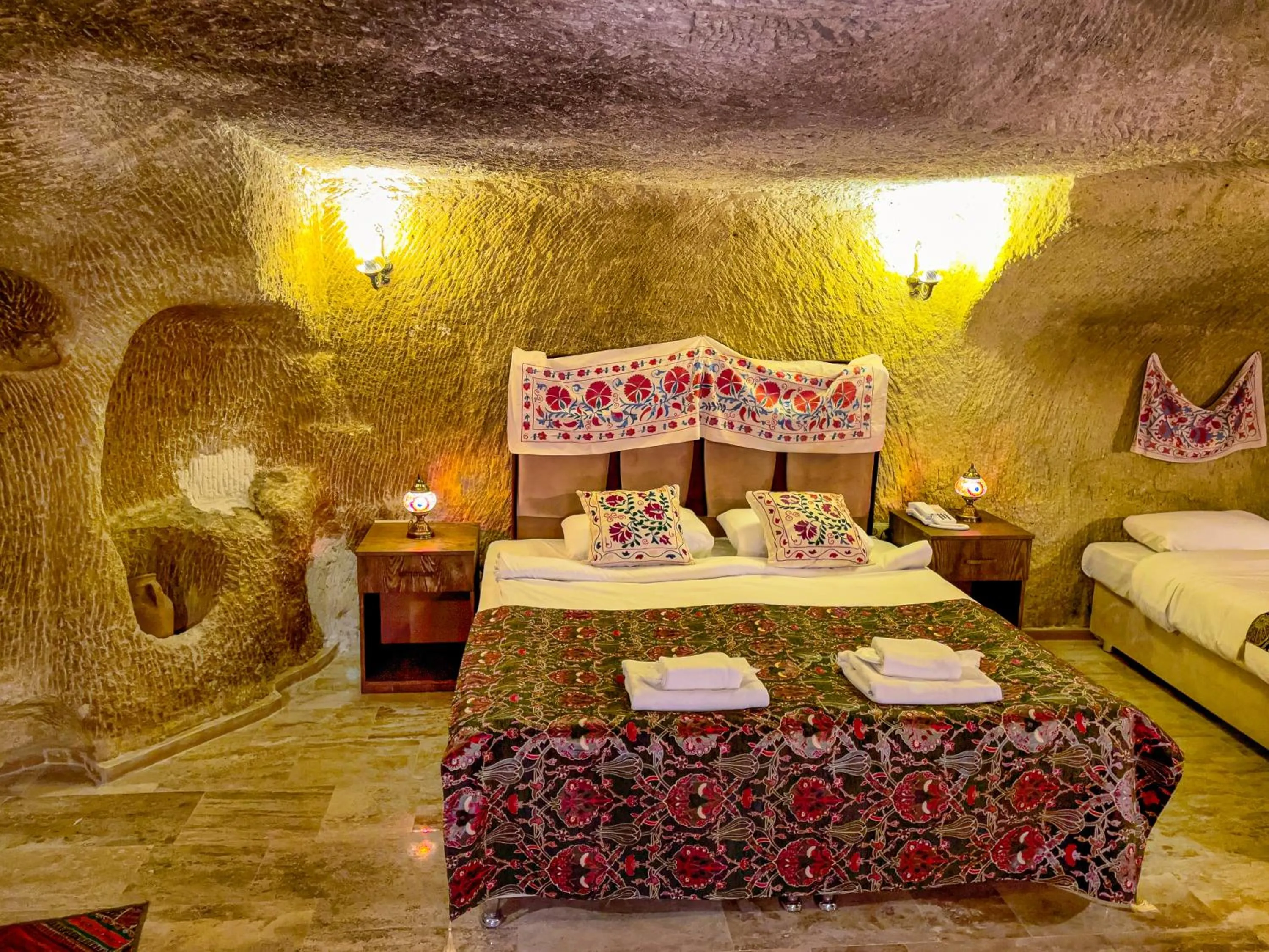 Bed in Heritage Cave Suites