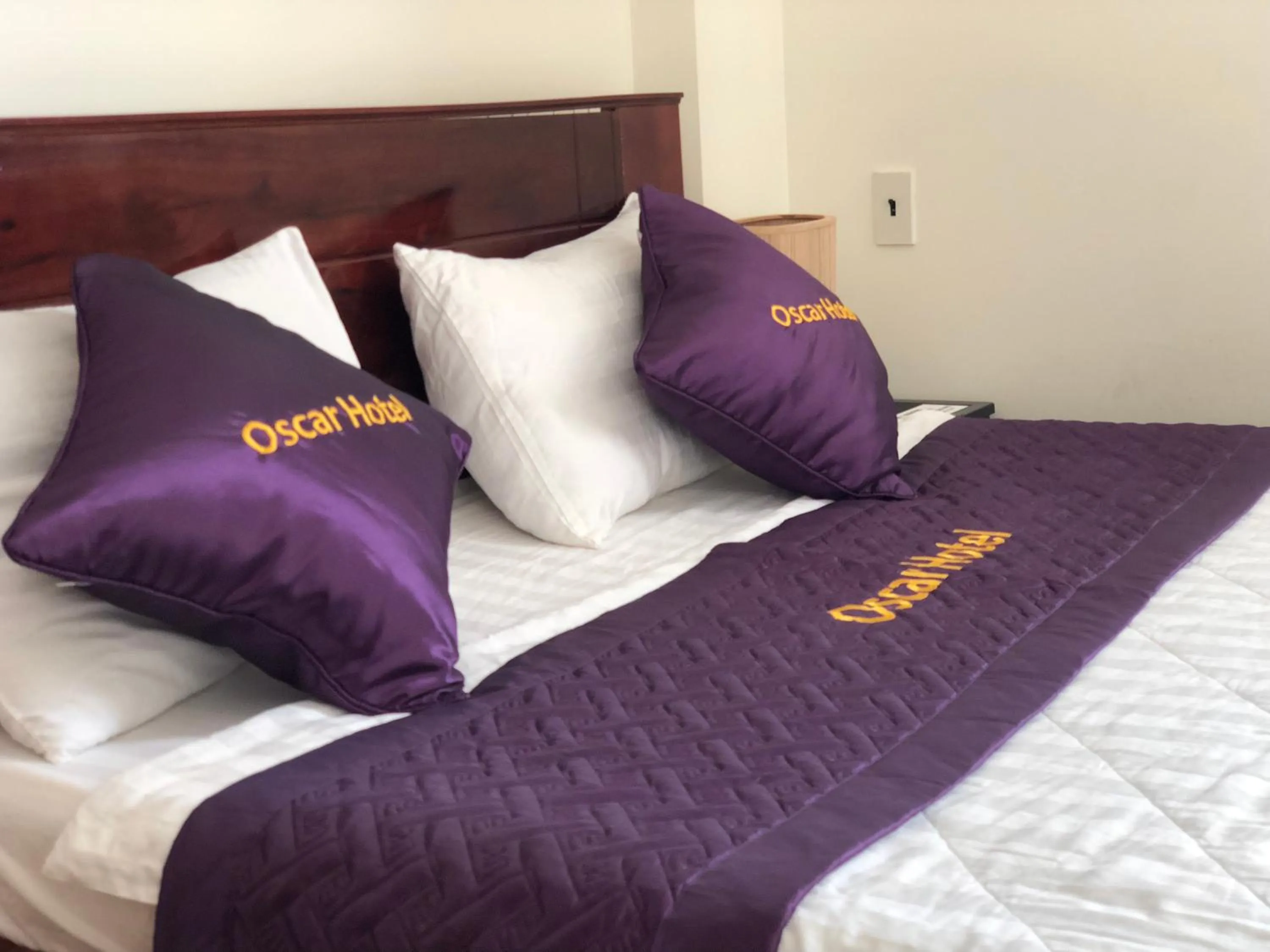 Bed in Oscar Hotel