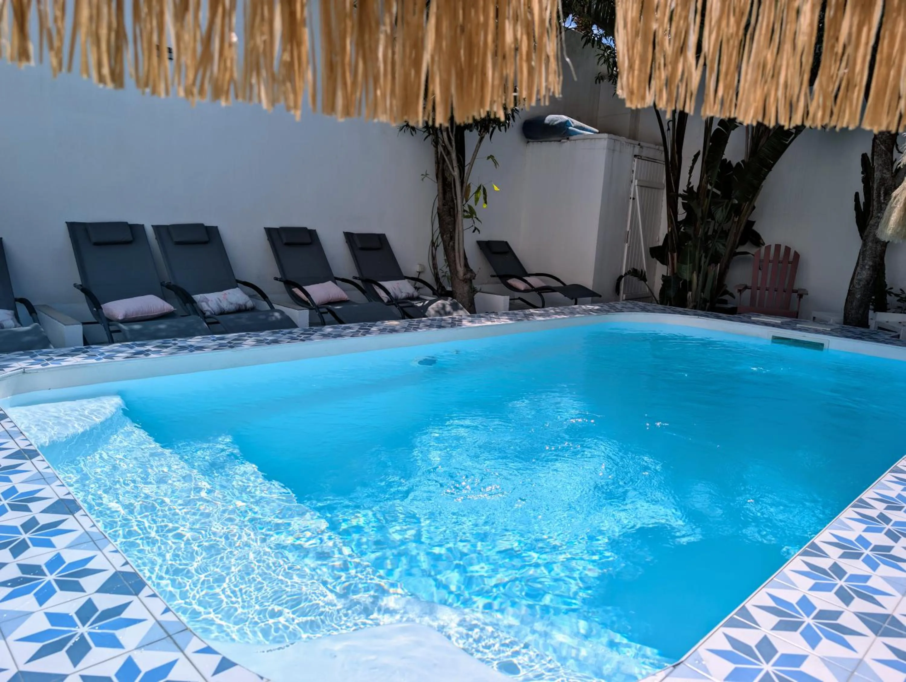 Swimming pool in Hôtel Mademoiselle