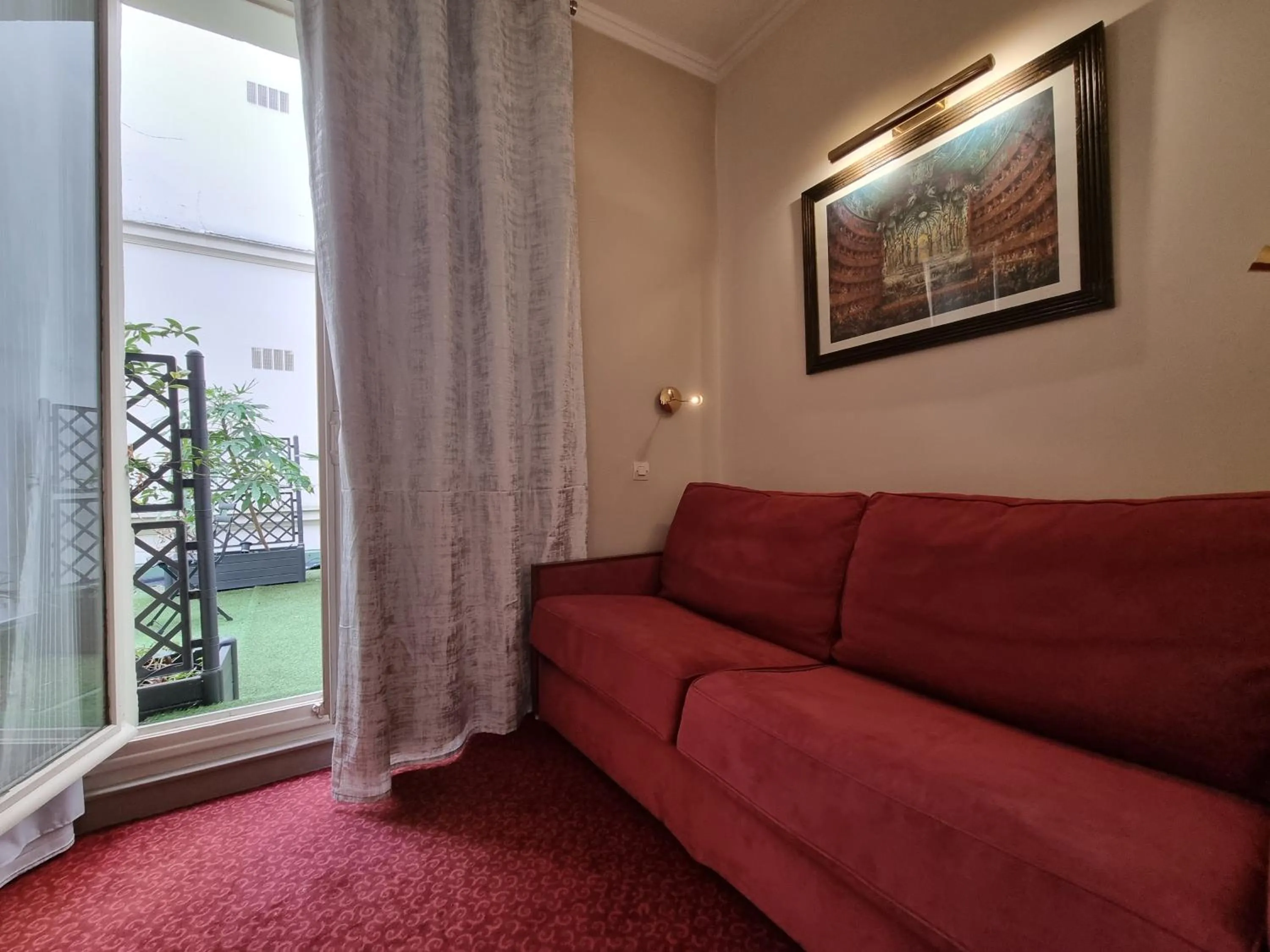 Living room in Hôtel France Eiffel