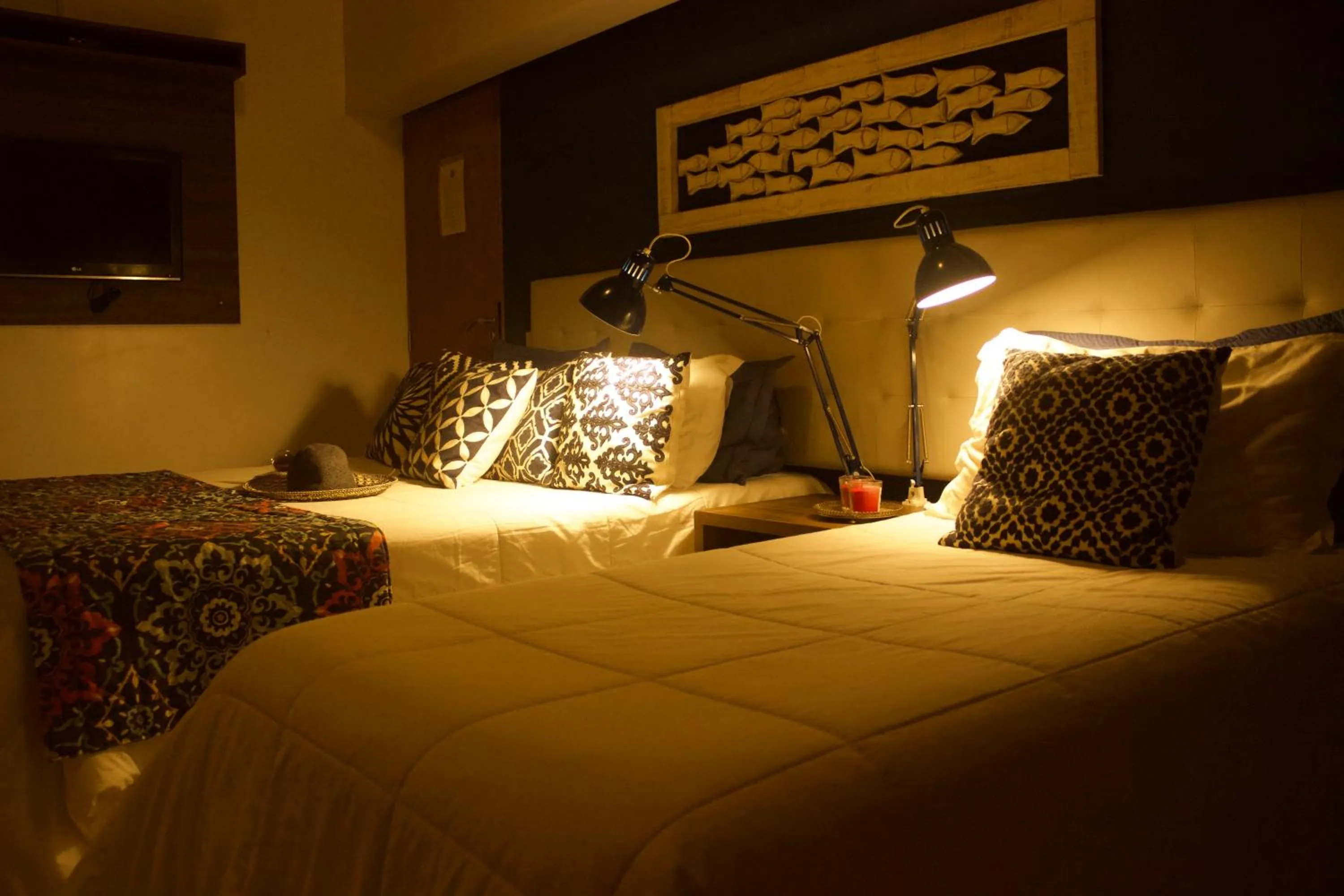 Bed in Pousada Ponta da Vigia