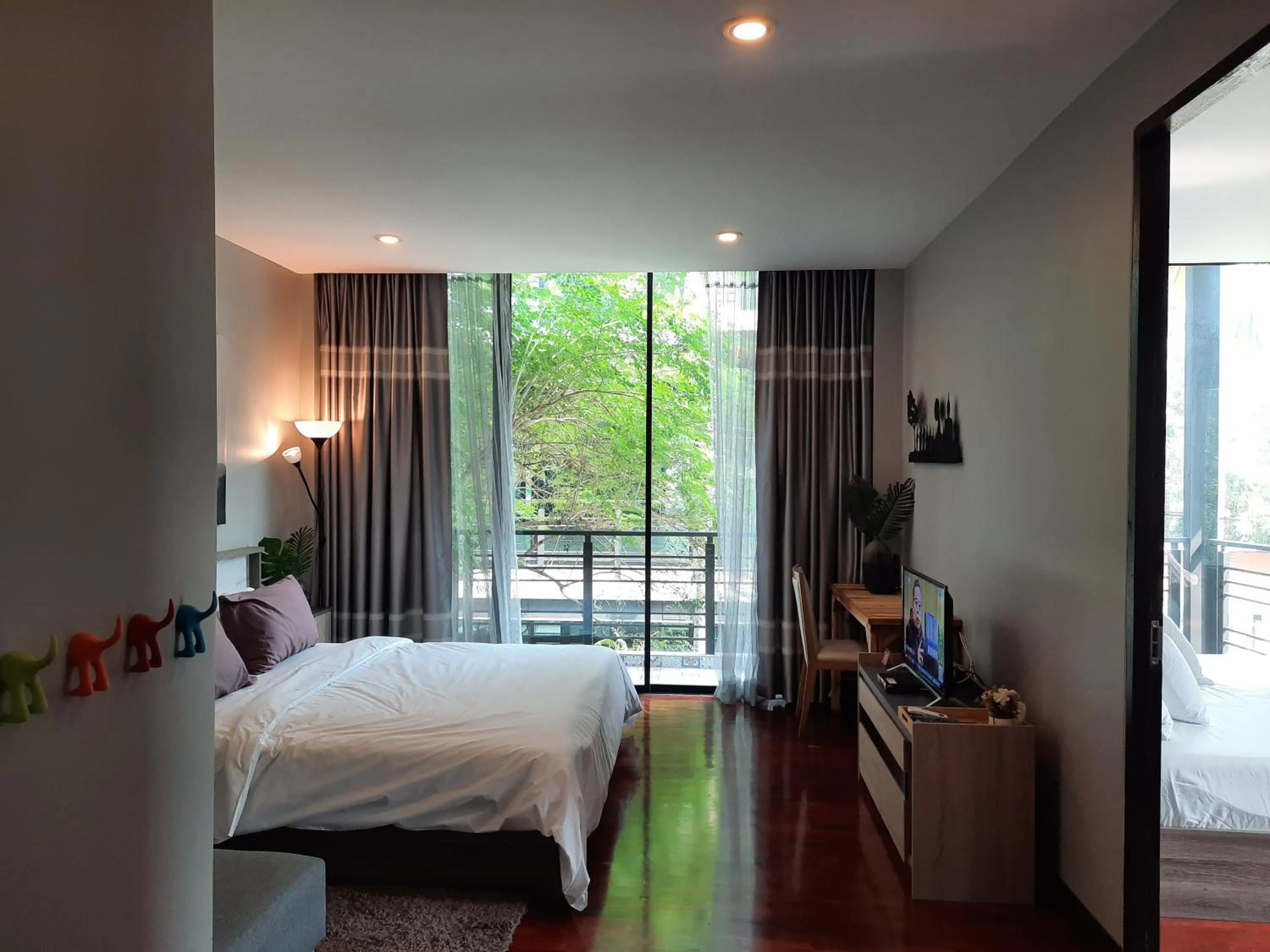 Communal lounge/ TV room, Bed in PomPom Home