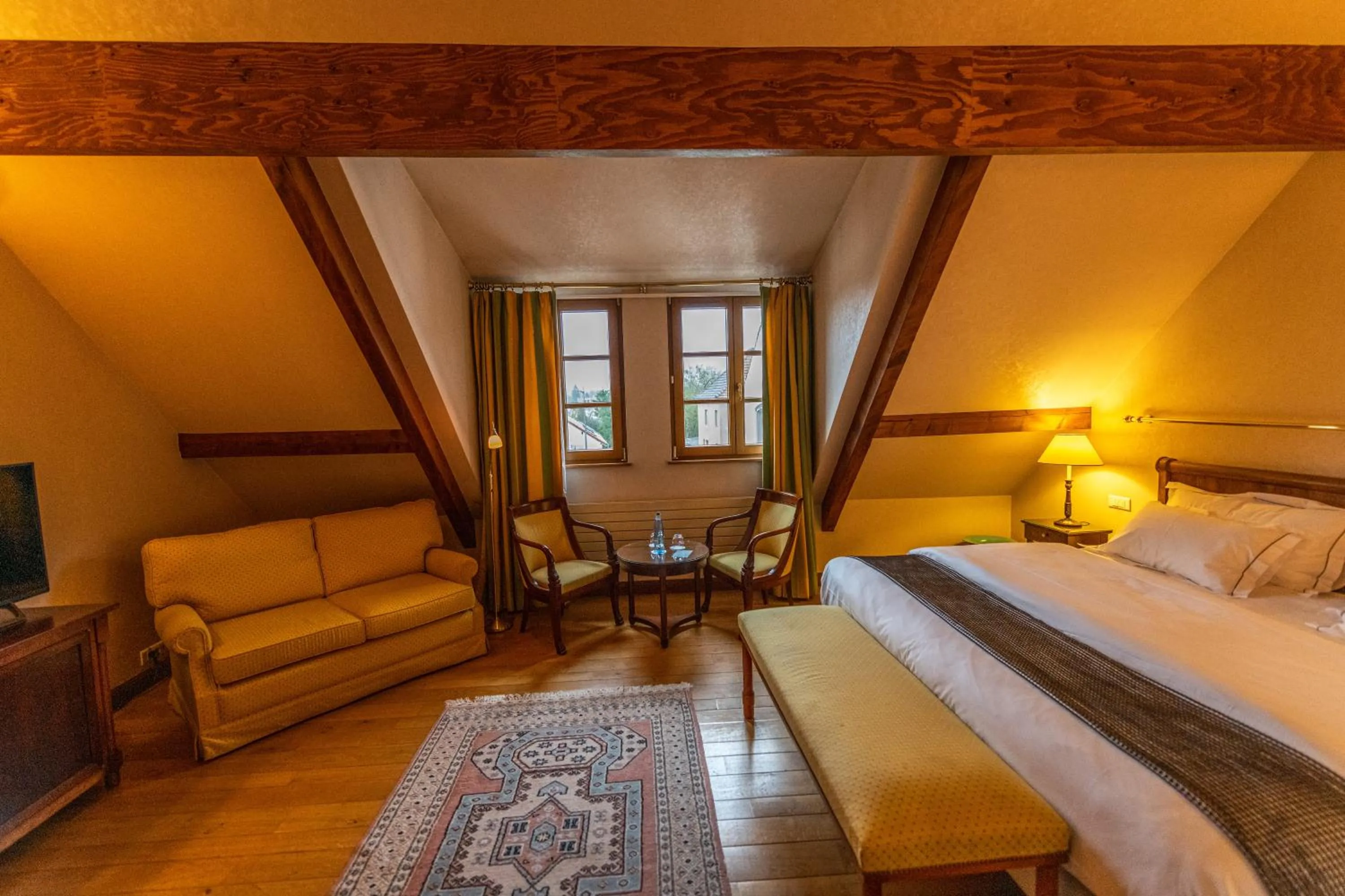 Bed in Auberge Saint Walfrid Hôtel Restaurant & Spa