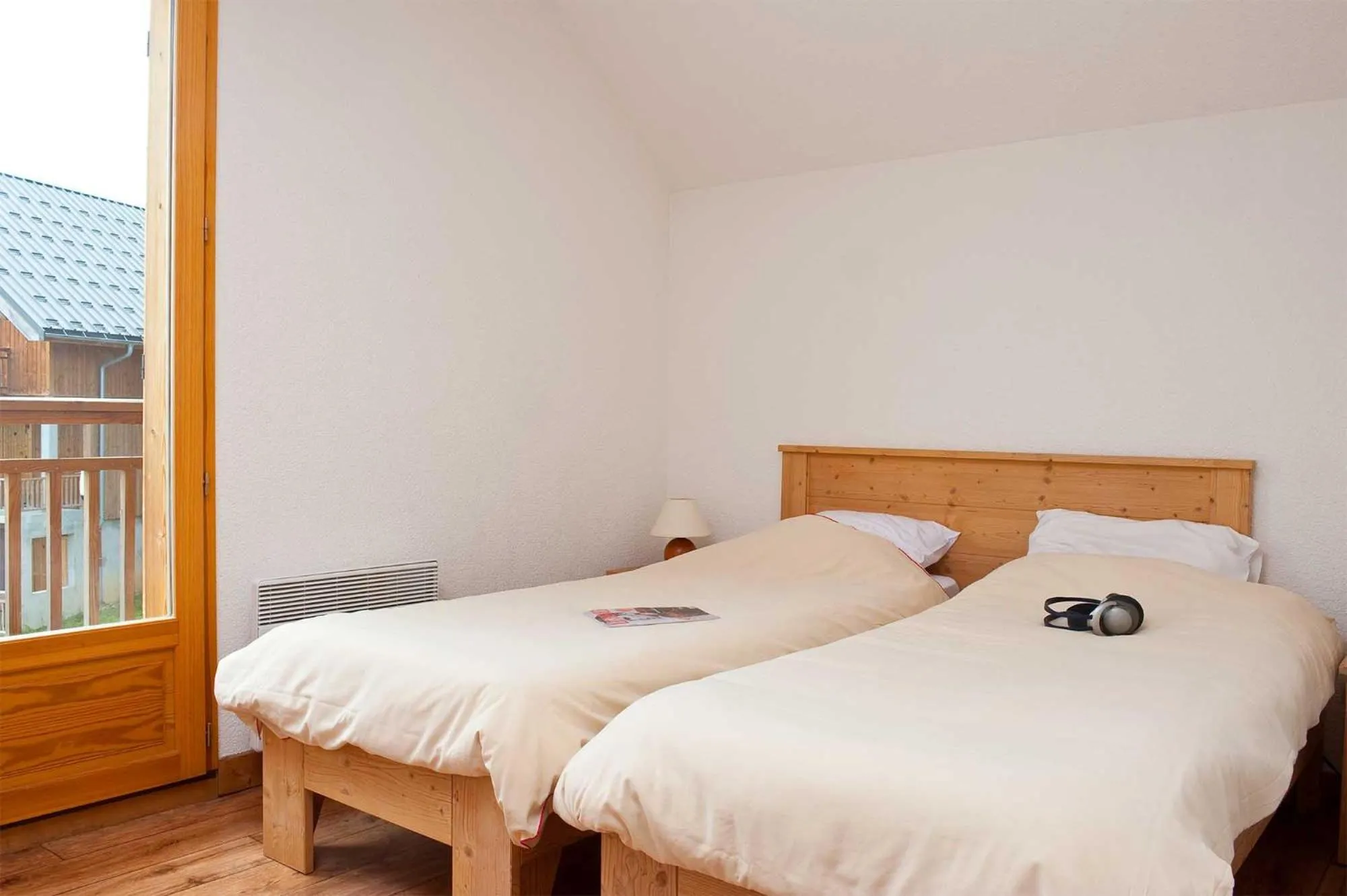 Bed in Madame Vacances Les Chalets Du Berger